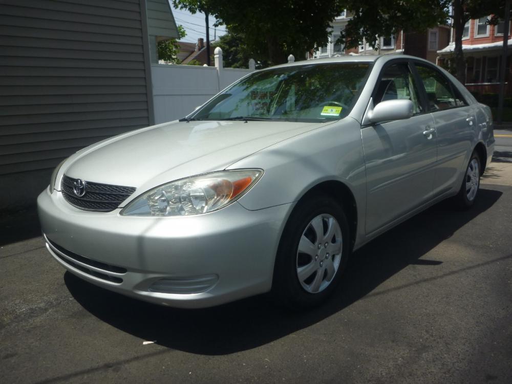 2003 SILVER /GREY CLOTH Toyota Camry LE (4T1BE32K23U) with an 2.4L L4 DOHC 16V engine, 4-Speed Automatic Overdrive transmission, located at 1018 Brunswick Ave, Trenton, NJ, 08638, (609) 989-0900, 40.240086, -74.748085 - Photo #0