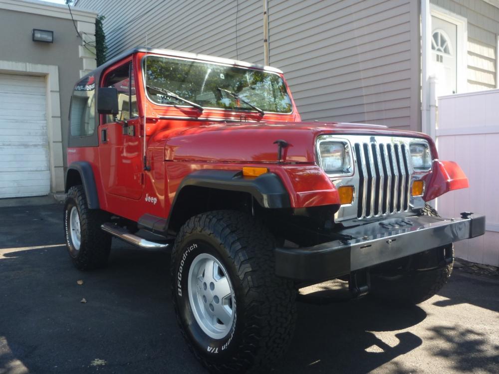 1994 RED /GREY LEATHER Jeep Wrangler S (1J4FY19P9RP) with an 2.5L L4 OHV 8V engine, MANUAL transmission, located at 1018 Brunswick Ave, Trenton, NJ, 08638, (609) 989-0900, 40.240086, -74.748085 - Photo #0