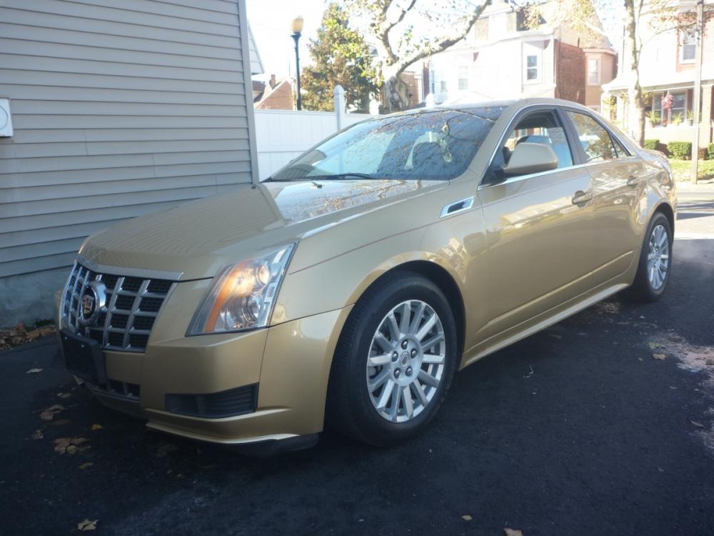2013 GOLD /TAN LEATHER Cadillac CTS Luxury AWD (1G6DG5E50D0) with an 3.0L V6 DOHC 24V FFV engine, 6-Speed Automatic transmission, located at 1018 Brunswick Ave, Trenton, NJ, 08638, (609) 989-0900, 40.240086, -74.748085 - Photo #0