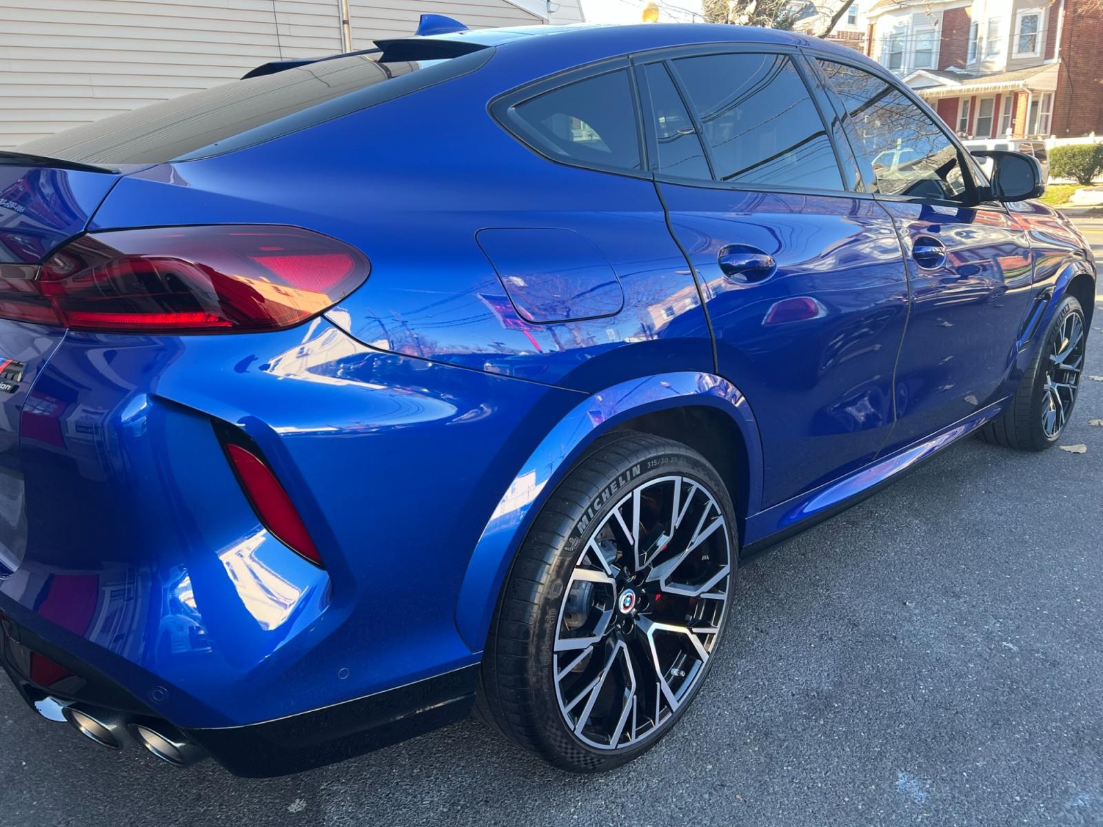 2022 Blue /Red/Black BMW X6 M Base (5YMCY0C07N9) with an 4.4L V8 DOHC 32V engine, 8A transmission, located at 1018 Brunswick Ave, Trenton, NJ, 08638, (609) 989-0900, 40.240086, -74.748085 - Holy Cow and Wow!!...That is the description on this absolutely stunning BMW X6 M Competition! Ordered by Anthony himself with the best color choice of Marina Bay Blue metallic and Red Interior to stand out on the road and to any enthusiast of the BMW X series! Executive Pkg. includes Remote Start, - Photo #4