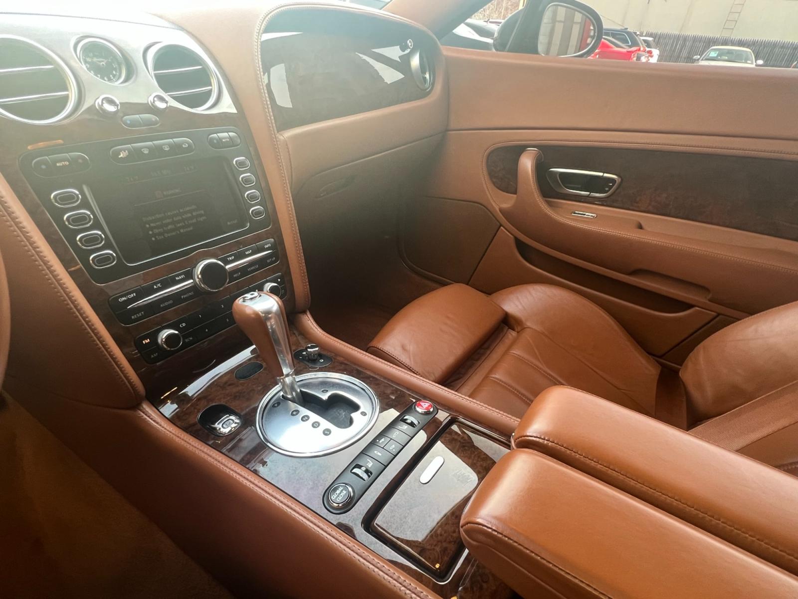 2004 Blue /TAN LEATHER Bentley Continental GT Coupe (SCBCR63W04C) with an 6.0L W12 DOHC 48V TURBO engine, 6-Speed Automatic Overdrive transmission, located at 1018 Brunswick Ave, Trenton, NJ, 08638, (609) 989-0900, 40.240086, -74.748085 - Photo #10