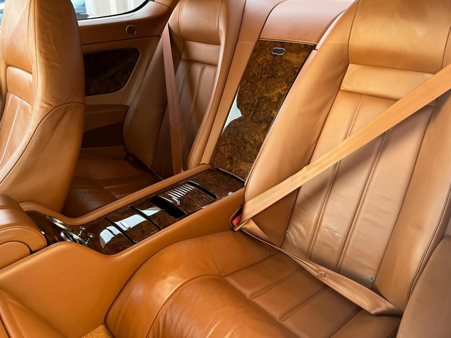 2004 Blue /TAN LEATHER Bentley Continental GT Coupe (SCBCR63W04C) with an 6.0L W12 DOHC 48V TURBO engine, 6-Speed Automatic Overdrive transmission, located at 1018 Brunswick Ave, Trenton, NJ, 08638, (609) 989-0900, 40.240086, -74.748085 - Holy Cow! This Bentley is stunning in every way and has only 38k Original Miles! Fully Serviced and Perfect Automobile. Brand New 22" Custom wheels! This vehicle was approx. $190k brand new! An incredible Value for this absolutely beautiful Bentley! Call Anthony to set up an appointment to come see - Photo#24