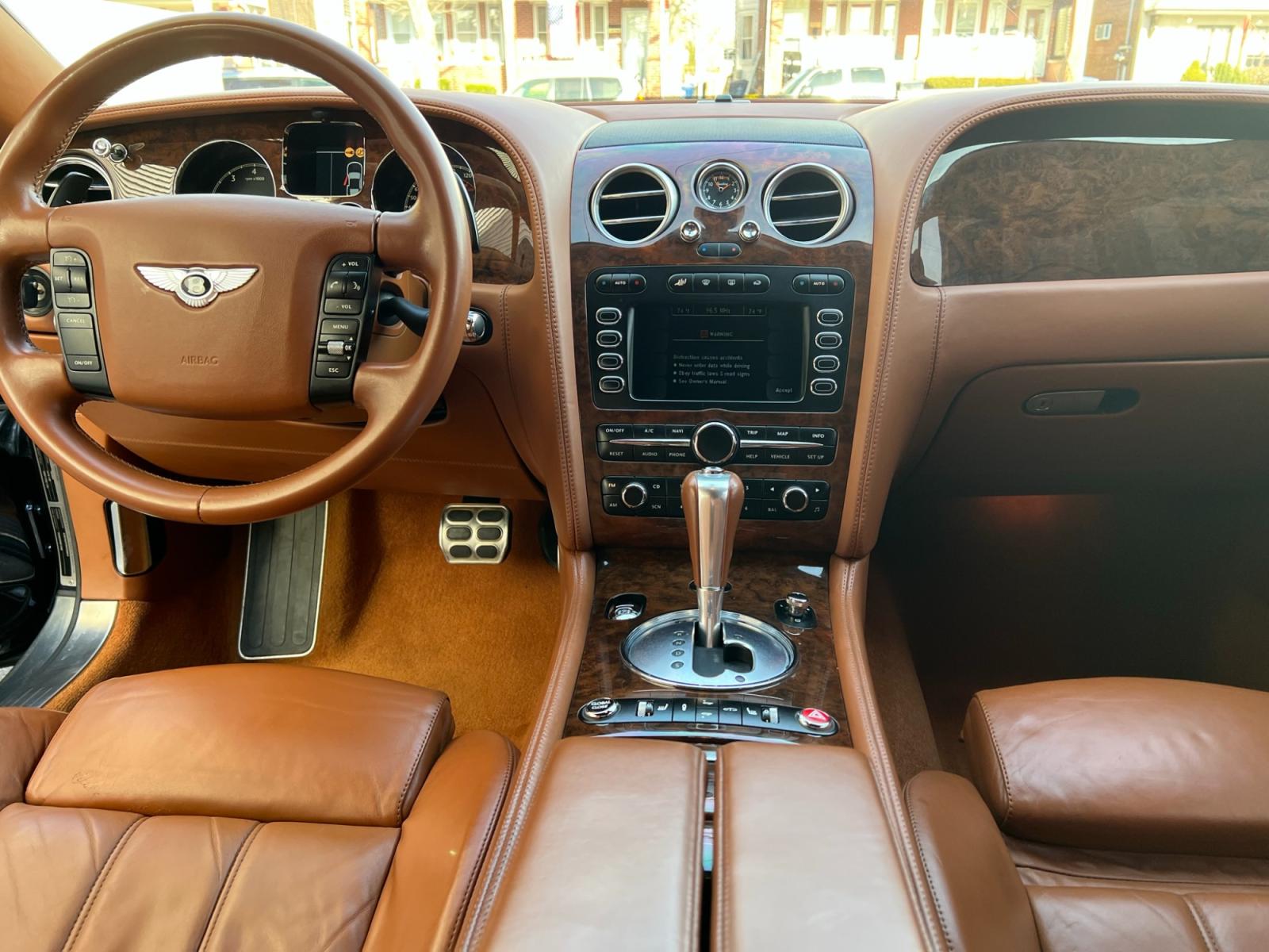 2004 Blue /TAN LEATHER Bentley Continental GT Coupe (SCBCR63W04C) with an 6.0L W12 DOHC 48V TURBO engine, 6-Speed Automatic Overdrive transmission, located at 1018 Brunswick Ave, Trenton, NJ, 08638, (609) 989-0900, 40.240086, -74.748085 - Holy Cow! This Bentley is stunning in every way and has only 38k Original Miles! Fully Serviced and Perfect Automobile. Brand New 22" Custom wheels! This vehicle was approx. $190k brand new! An incredible Value for this absolutely beautiful Bentley! Call Anthony to set up an appointment to come see - Photo #21