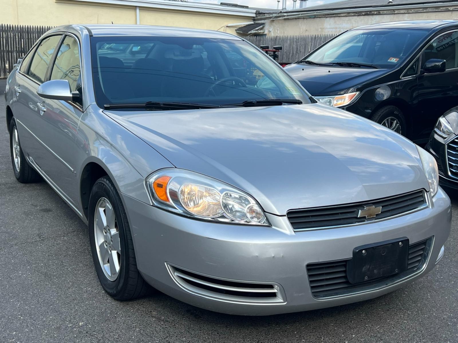 2007 SILVER /Gray Chevrolet Impala LT1 3.5L (2G1WT58N279) with an 3.5L V6 OHV 12V engine, 4-Speed Automatic Overdrive transmission, located at 1018 Brunswick Ave, Trenton, NJ, 08638, (609) 989-0900, 40.240086, -74.748085 - Holy Cow Martha! That's who owned this Car and she was 85 years old! This was her grocery and church vehicle literally! Serviced up on a regular basis! Super clean and LOW LOW MILES!! A really great buy for the next 5 years on transportation!! Please call Anthony ASAP and set up an appointment to s - Photo #2