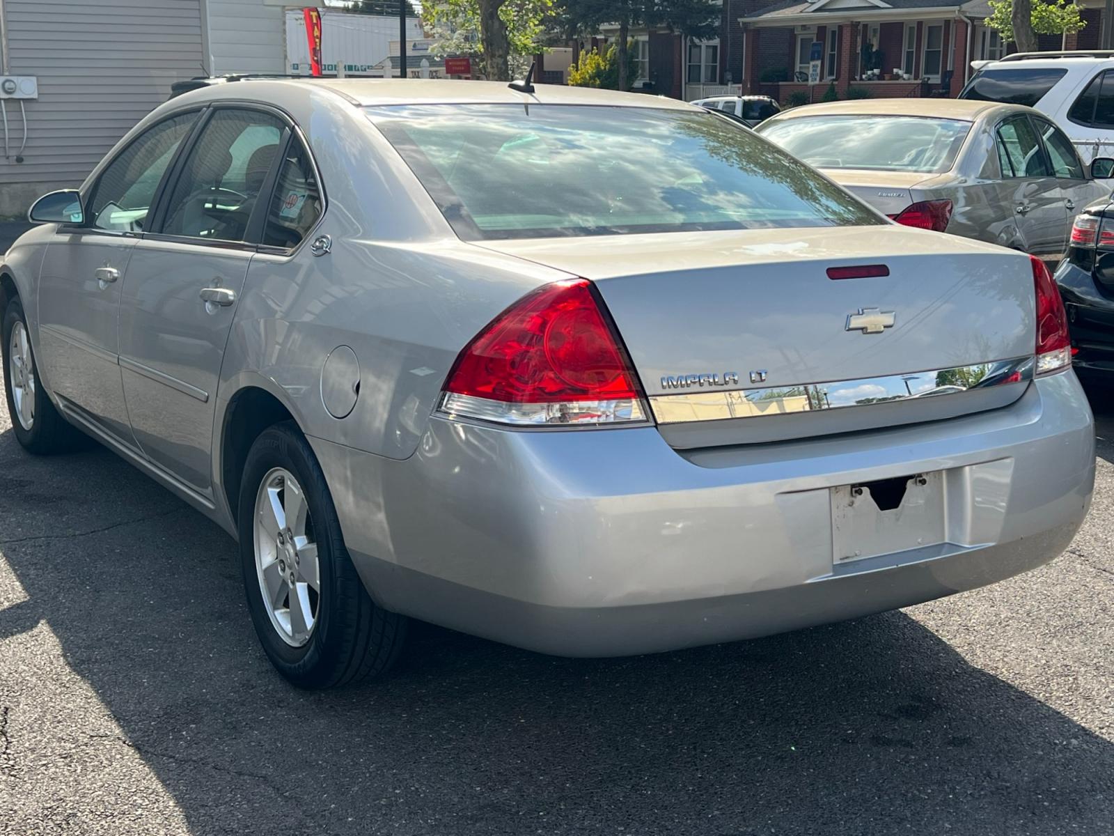2007 SILVER /Gray Chevrolet Impala LT1 3.5L (2G1WT58N279) with an 3.5L V6 OHV 12V engine, 4-Speed Automatic Overdrive transmission, located at 1018 Brunswick Ave, Trenton, NJ, 08638, (609) 989-0900, 40.240086, -74.748085 - Holy Cow Martha! That's who owned this Car and she was 85 years old! This was her grocery and church vehicle literally! Serviced up on a regular basis! Super clean and LOW LOW MILES!! A really great buy for the next 5 years on transportation!! Please call Anthony ASAP and set up an appointment to s - Photo #4