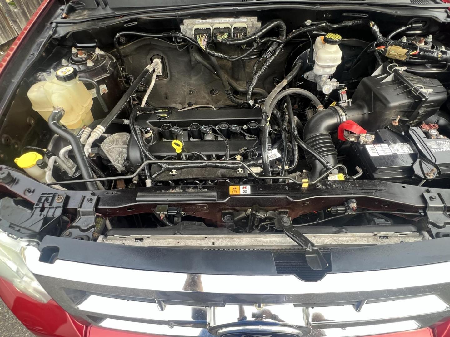 2012 Red /Gray Ford Escape XLT FWD (1FMCU0D73CK) with an 2.5L L4 DOHC 16V engine, 6-Speed Automatic transmission, located at 1018 Brunswick Ave, Trenton, NJ, 08638, (609) 989-0900, 40.240086, -74.748085 - This Ford Escape runs great and is very clean! A very impressive SUV for $3995! A must see and drive!! - Photo#15