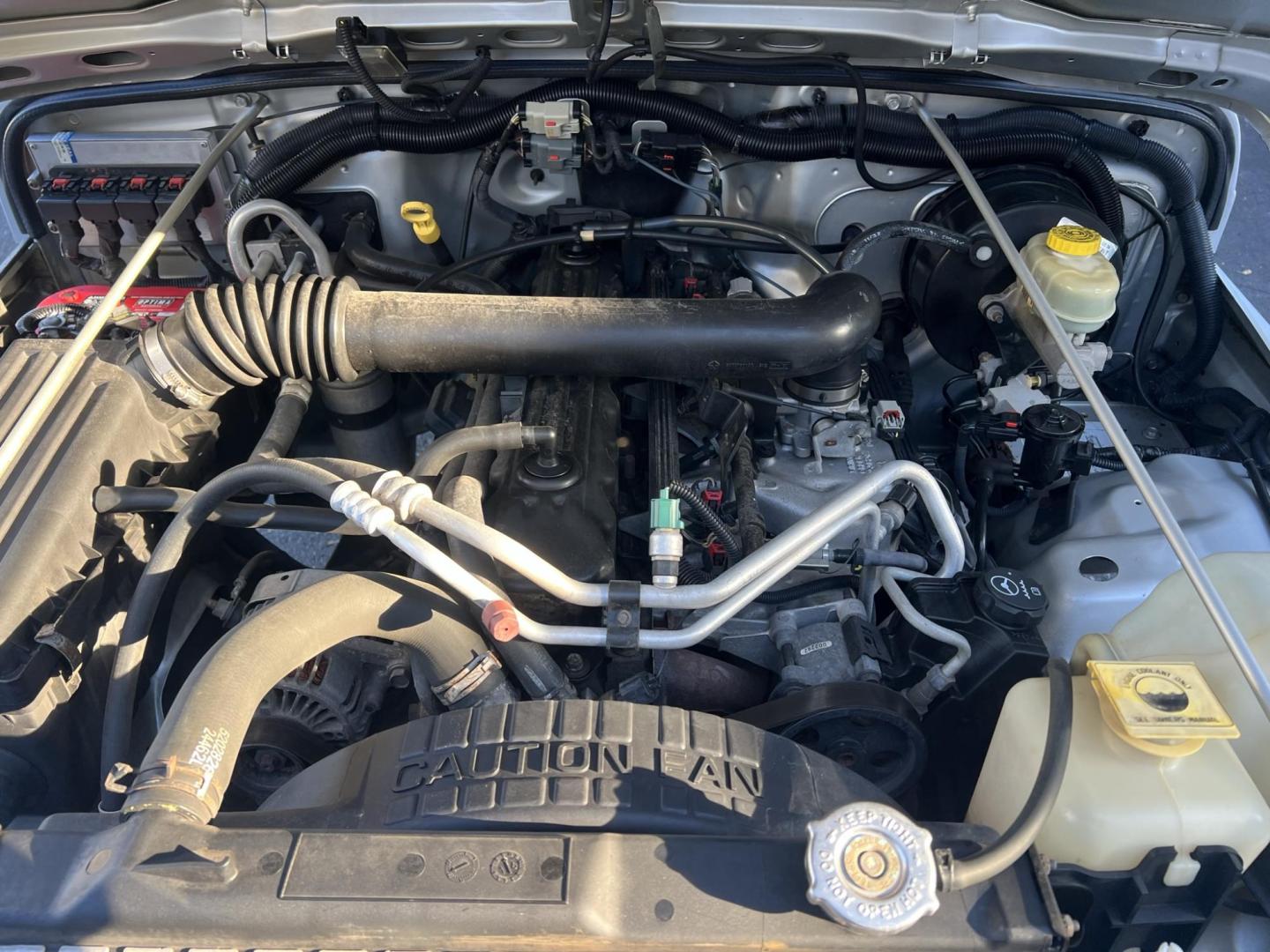 2005 SILVER /Gray Jeep Wrangler Unlimited (1J4FA44S25P) with an 4.0L L6 OHV 12V engine, located at 1018 Brunswick Ave, Trenton, NJ, 08638, (609) 989-0900, 40.240086, -74.748085 - Rare LJ model! Super Clean Automatic Unlimited Jeep Wrangler! Just serviced and ready to go 100% A must see to believe how nice this 1 owner gem is, both soft and hard top available! Call Anthony to set up an appointment to see this beauty!! 609-273-5100 - Photo#13