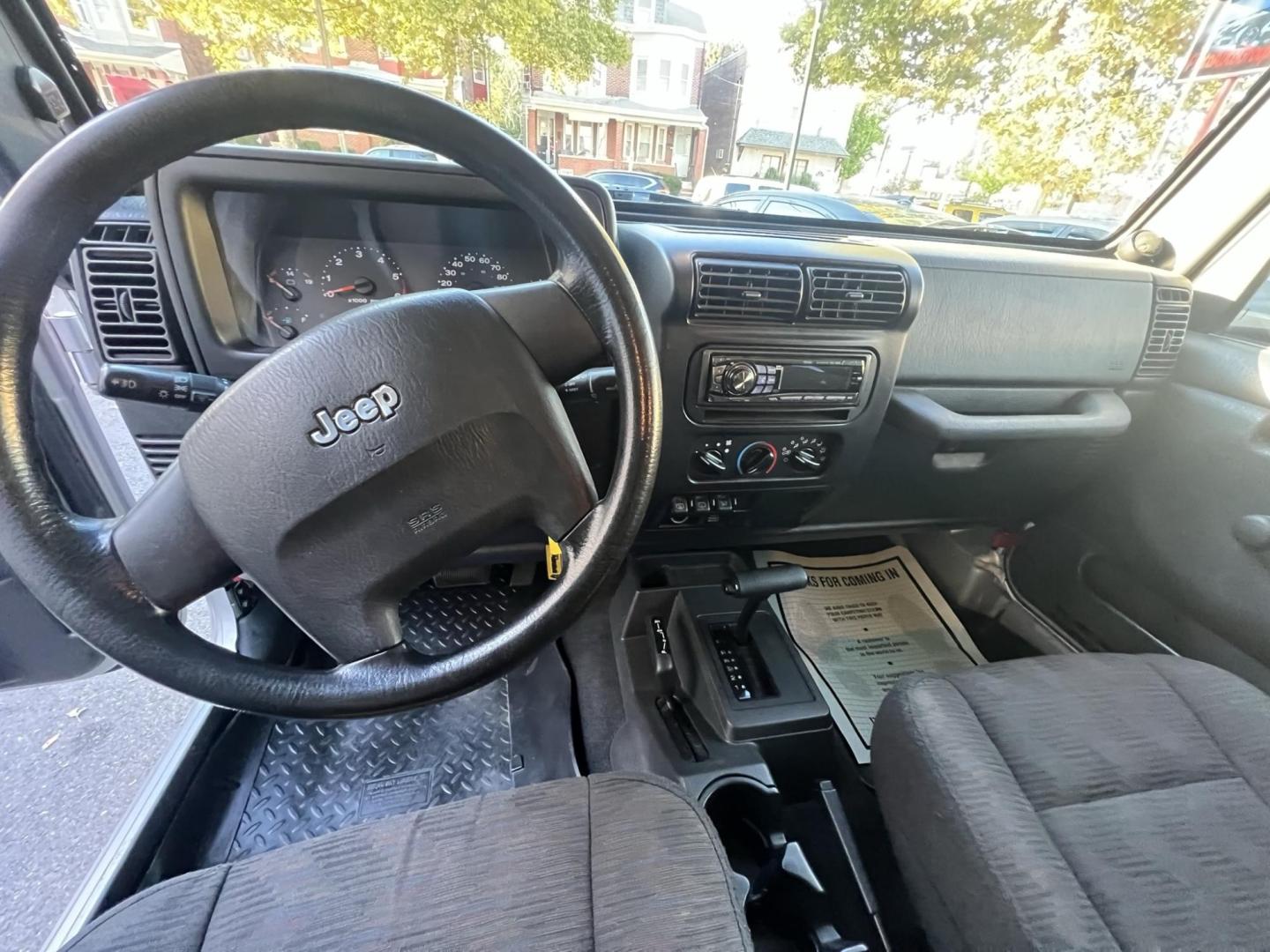 2005 SILVER /Gray Jeep Wrangler Unlimited (1J4FA44S25P) with an 4.0L L6 OHV 12V engine, located at 1018 Brunswick Ave, Trenton, NJ, 08638, (609) 989-0900, 40.240086, -74.748085 - Rare LJ model! Super Clean Automatic Unlimited Jeep Wrangler! Just serviced and ready to go 100% A must see to believe how nice this 1 owner gem is, both soft and hard top available! Call Anthony to set up an appointment to see this beauty!! 609-273-5100 - Photo#15
