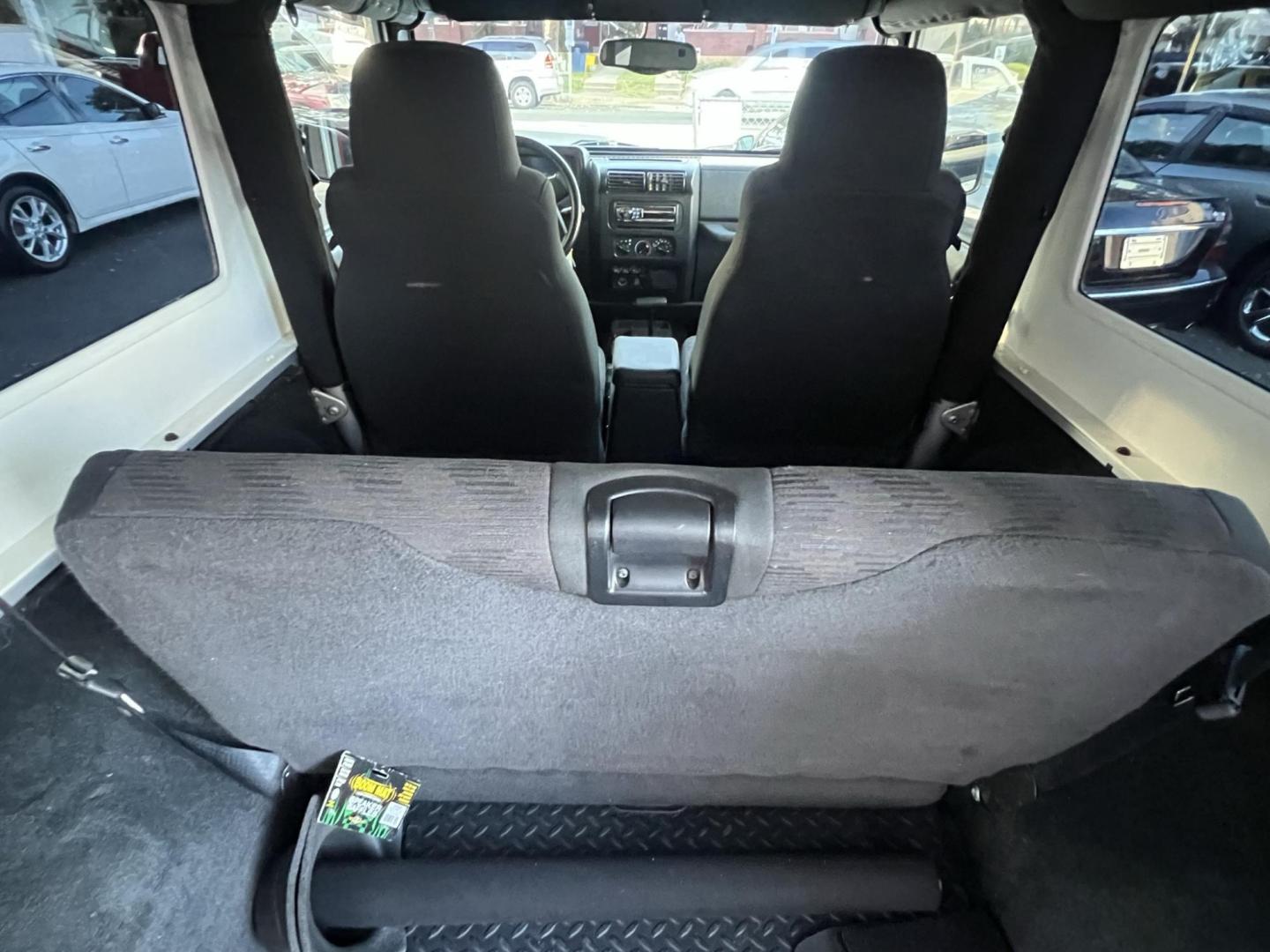 2005 SILVER /Gray Jeep Wrangler Unlimited (1J4FA44S25P) with an 4.0L L6 OHV 12V engine, located at 1018 Brunswick Ave, Trenton, NJ, 08638, (609) 989-0900, 40.240086, -74.748085 - Rare LJ model! Super Clean Automatic Unlimited Jeep Wrangler! Just serviced and ready to go 100% A must see to believe how nice this 1 owner gem is, both soft and hard top available! Call Anthony to set up an appointment to see this beauty!! 609-273-5100 - Photo#11