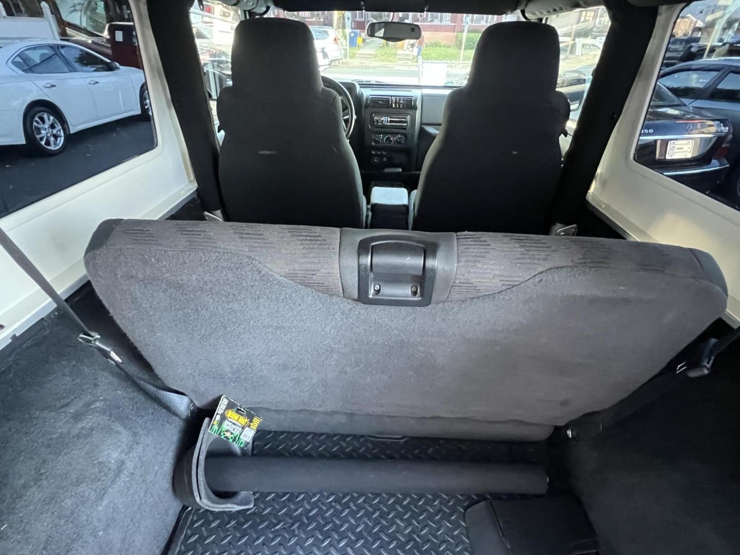 2005 SILVER /Gray Jeep Wrangler Unlimited (1J4FA44S25P) with an 4.0L L6 OHV 12V engine, located at 1018 Brunswick Ave, Trenton, NJ, 08638, (609) 989-0900, 40.240086, -74.748085 - Rare LJ model! Super Clean Automatic Unlimited Jeep Wrangler! Just serviced and ready to go 100% A must see to believe how nice this 1 owner gem is, both soft and hard top available! Call Anthony to set up an appointment to see this beauty!! 609-273-5100 - Photo#12