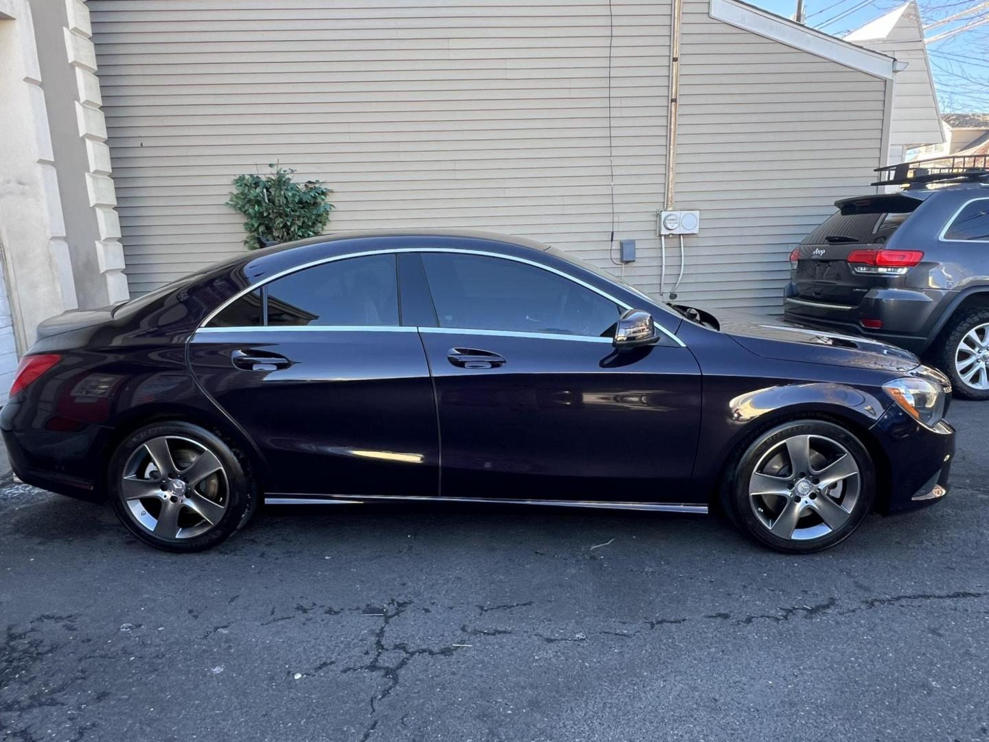2015 BLACK /Black Leather Mercedes-Benz CLA-Class CLA250 4MATIC (WDDSJ4GB8FN) with an 2.0L L4 DOHC 16V engine, 7A transmission, located at 1018 Brunswick Ave, Trenton, NJ, 08638, (609) 989-0900, 40.240086, -74.748085 - Photo#1