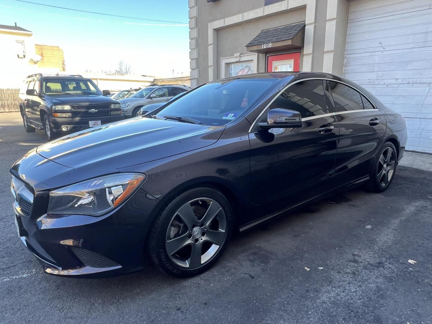 2015 BLACK /Black Leather Mercedes-Benz CLA-Class CLA250 4MATIC (WDDSJ4GB8FN) with an 2.0L L4 DOHC 16V engine, 7A transmission, located at 1018 Brunswick Ave, Trenton, NJ, 08638, (609) 989-0900, 40.240086, -74.748085 - Photo#2