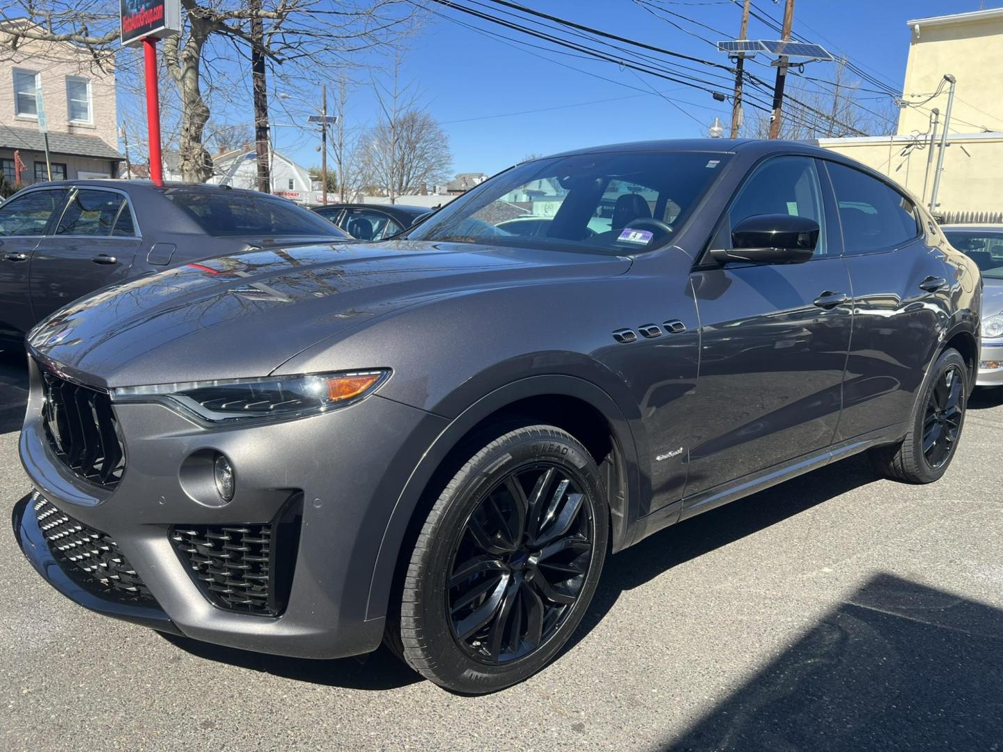 2019 GRAY /Black Leather Maserati Levante GranSport (ZN661XUSXKX) with an 3.0L V6 DOHC 24V engine, 8A transmission, located at 1018 Brunswick Ave, Trenton, NJ, 08638, (609) 989-0900, 40.240086, -74.748085 - An original Window Sticker MSRP of $94K, this All wheel Drive Levante speaks volumes to every 8 speed 6 cyl. SUV out there in this price range! Options include Climate Pkg.w heated rear seats and washer nozzles, Driver Assistance Pkg. Blue Brake Calipers inside Gloss Black 20" Wheels and Brand New - Photo#3