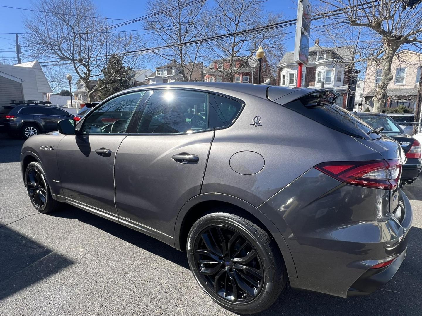 2019 GRAY /Black Leather Maserati Levante GranSport (ZN661XUSXKX) with an 3.0L V6 DOHC 24V engine, 8A transmission, located at 1018 Brunswick Ave, Trenton, NJ, 08638, (609) 989-0900, 40.240086, -74.748085 - An original Window Sticker MSRP of $94K, this All wheel Drive Levante speaks volumes to every 8 speed 6 cyl. SUV out there in this price range! Options include Climate Pkg.w heated rear seats and washer nozzles, Driver Assistance Pkg. Blue Brake Calipers inside Gloss Black 20" Wheels and Brand New - Photo#5