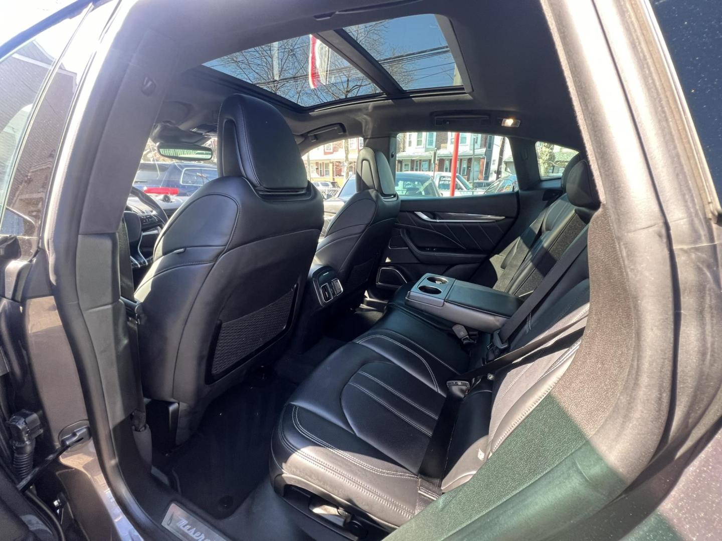2019 GRAY /Black Leather Maserati Levante GranSport (ZN661XUSXKX) with an 3.0L V6 DOHC 24V engine, 8A transmission, located at 1018 Brunswick Ave, Trenton, NJ, 08638, (609) 989-0900, 40.240086, -74.748085 - An original Window Sticker MSRP of $94K, this All wheel Drive Levante speaks volumes to every 8 speed 6 cyl. SUV out there in this price range! Options include Climate Pkg.w heated rear seats and washer nozzles, Driver Assistance Pkg. Blue Brake Calipers inside Gloss Black 20" Wheels and Brand New - Photo#11