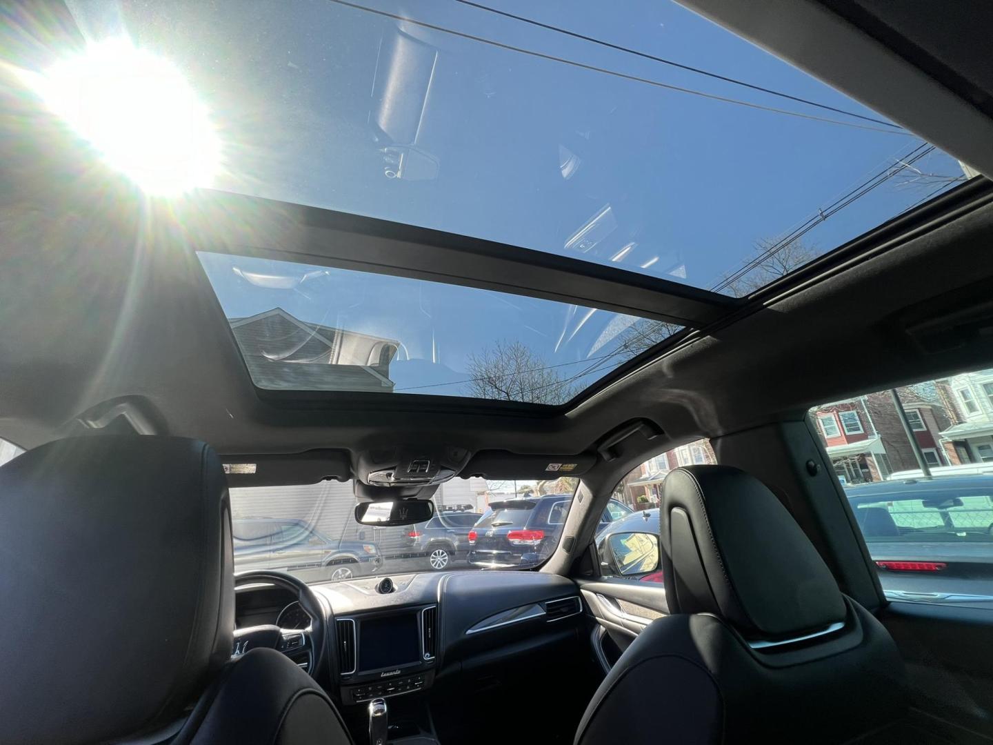 2019 GRAY /Black Leather Maserati Levante GranSport (ZN661XUSXKX) with an 3.0L V6 DOHC 24V engine, 8A transmission, located at 1018 Brunswick Ave, Trenton, NJ, 08638, (609) 989-0900, 40.240086, -74.748085 - An original Window Sticker MSRP of $94K, this All wheel Drive Levante speaks volumes to every 8 speed 6 cyl. SUV out there in this price range! Options include Climate Pkg.w heated rear seats and washer nozzles, Driver Assistance Pkg. Blue Brake Calipers inside Gloss Black 20" Wheels and Brand New - Photo#13