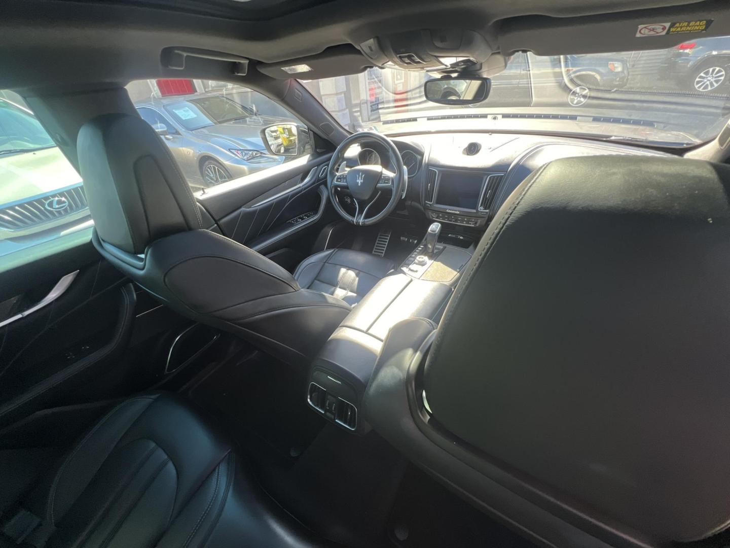 2019 GRAY /Black Leather Maserati Levante GranSport (ZN661XUSXKX) with an 3.0L V6 DOHC 24V engine, 8A transmission, located at 1018 Brunswick Ave, Trenton, NJ, 08638, (609) 989-0900, 40.240086, -74.748085 - An original Window Sticker MSRP of $94K, this All wheel Drive Levante speaks volumes to every 8 speed 6 cyl. SUV out there in this price range! Options include Climate Pkg.w heated rear seats and washer nozzles, Driver Assistance Pkg. Blue Brake Calipers inside Gloss Black 20" Wheels and Brand New - Photo#19