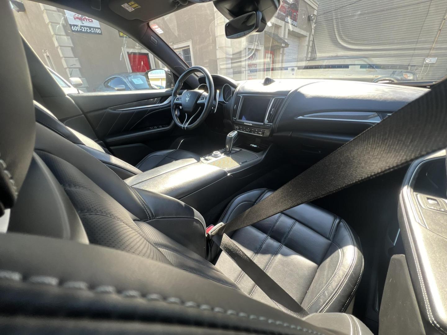 2019 GRAY /Black Leather Maserati Levante GranSport (ZN661XUSXKX) with an 3.0L V6 DOHC 24V engine, 8A transmission, located at 1018 Brunswick Ave, Trenton, NJ, 08638, (609) 989-0900, 40.240086, -74.748085 - An original Window Sticker MSRP of $94K, this All wheel Drive Levante speaks volumes to every 8 speed 6 cyl. SUV out there in this price range! Options include Climate Pkg.w heated rear seats and washer nozzles, Driver Assistance Pkg. Blue Brake Calipers inside Gloss Black 20" Wheels and Brand New - Photo#20