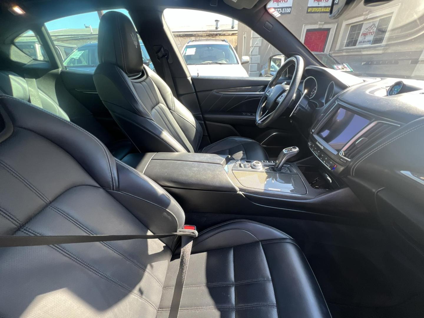 2019 GRAY /Black Leather Maserati Levante GranSport (ZN661XUSXKX) with an 3.0L V6 DOHC 24V engine, 8A transmission, located at 1018 Brunswick Ave, Trenton, NJ, 08638, (609) 989-0900, 40.240086, -74.748085 - An original Window Sticker MSRP of $94K, this All wheel Drive Levante speaks volumes to every 8 speed 6 cyl. SUV out there in this price range! Options include Climate Pkg.w heated rear seats and washer nozzles, Driver Assistance Pkg. Blue Brake Calipers inside Gloss Black 20" Wheels and Brand New - Photo#21