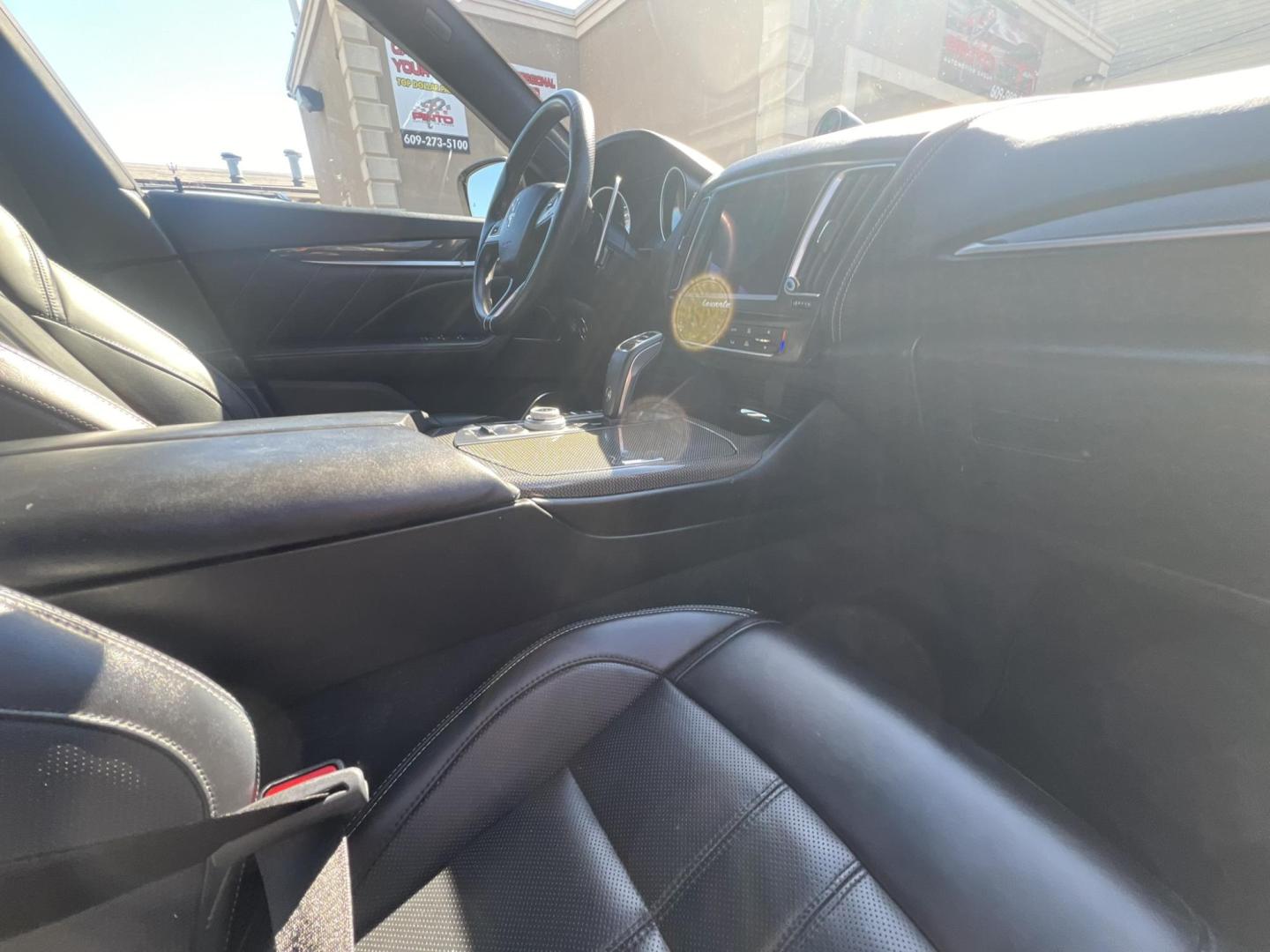 2019 GRAY /Black Leather Maserati Levante GranSport (ZN661XUSXKX) with an 3.0L V6 DOHC 24V engine, 8A transmission, located at 1018 Brunswick Ave, Trenton, NJ, 08638, (609) 989-0900, 40.240086, -74.748085 - An original Window Sticker MSRP of $94K, this All wheel Drive Levante speaks volumes to every 8 speed 6 cyl. SUV out there in this price range! Options include Climate Pkg.w heated rear seats and washer nozzles, Driver Assistance Pkg. Blue Brake Calipers inside Gloss Black 20" Wheels and Brand New - Photo#22