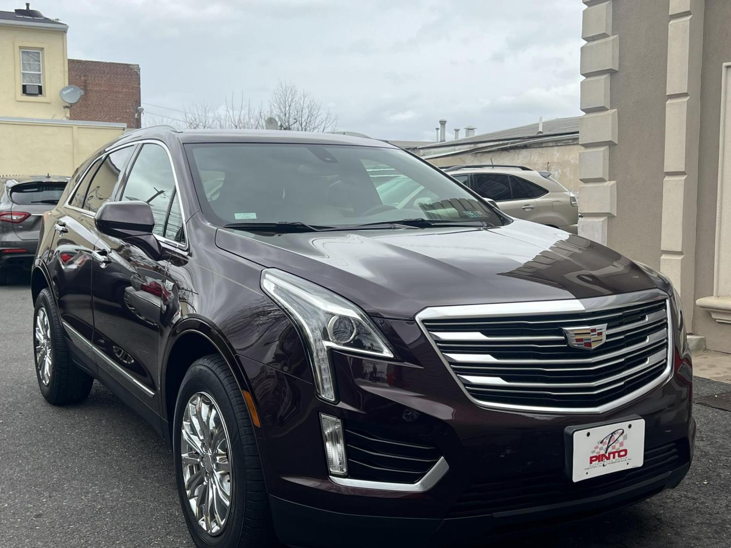 2017 Burgundy /Tan Leather Cadillac XT5 Base (1GYKNARS7HZ) with an 3.6L V6 DOHC 24V engine, 8A transmission, located at 1018 Brunswick Ave, Trenton, NJ, 08638, (609) 989-0900, 40.240086, -74.748085 - Photo#1