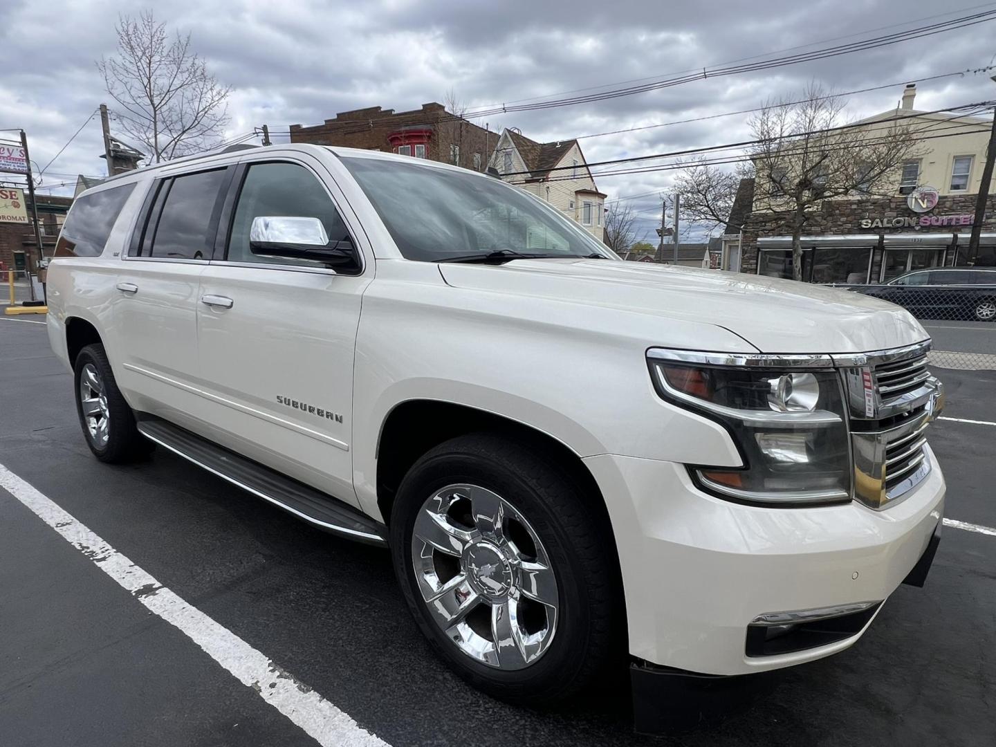 2015 White /Burgundy Chevrolet Suburban LTZ 1500 4WD (1GNSKKKCXFR) with an 5.3L V8 OHV 16V engine, 6-Speed Automatic transmission, located at 1018 Brunswick Ave, Trenton, NJ, 08638, (609) 989-0900, 40.240086, -74.748085 - Photo#2
