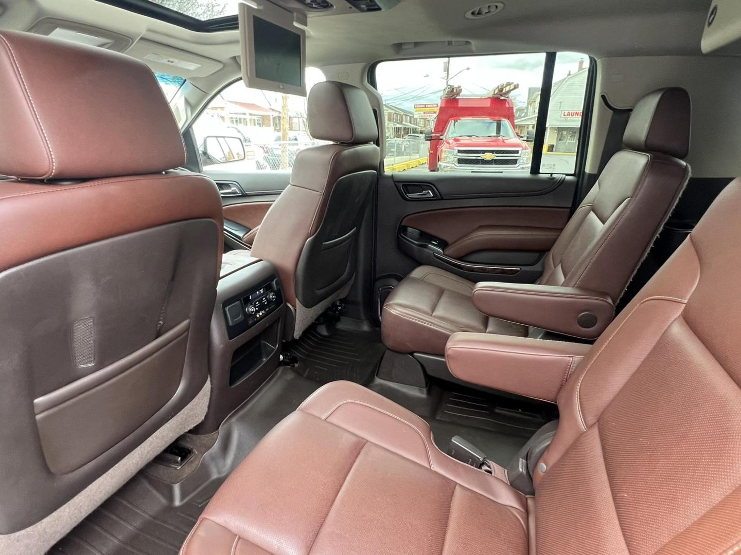 2015 White /Burgundy Chevrolet Suburban LTZ 1500 4WD (1GNSKKKCXFR) with an 5.3L V8 OHV 16V engine, 6-Speed Automatic transmission, located at 1018 Brunswick Ave, Trenton, NJ, 08638, (609) 989-0900, 40.240086, -74.748085 - Photo#7