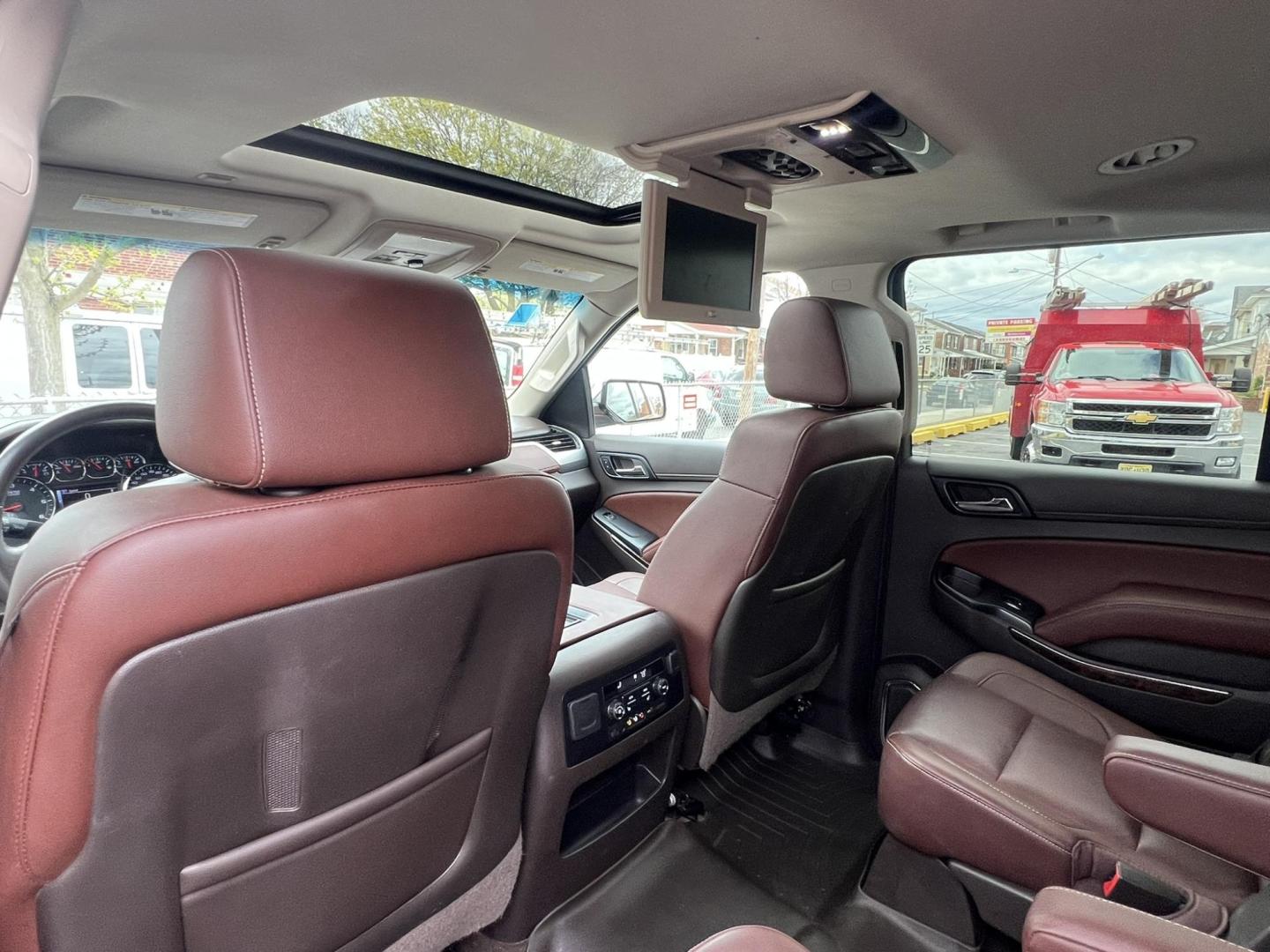 2015 White /Burgundy Chevrolet Suburban LTZ 1500 4WD (1GNSKKKCXFR) with an 5.3L V8 OHV 16V engine, 6-Speed Automatic transmission, located at 1018 Brunswick Ave, Trenton, NJ, 08638, (609) 989-0900, 40.240086, -74.748085 - Photo#9