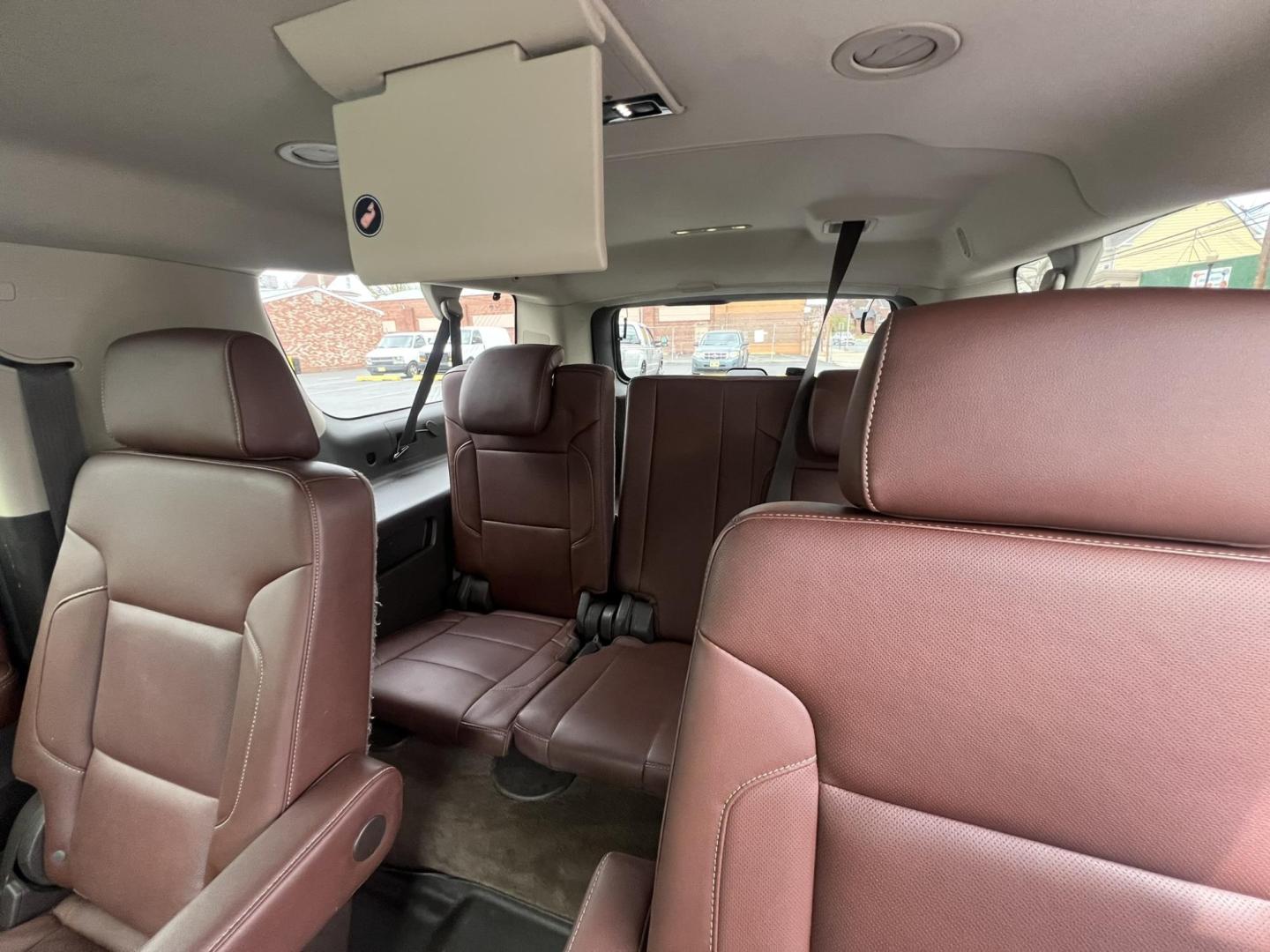 2015 White /Burgundy Chevrolet Suburban LTZ 1500 4WD (1GNSKKKCXFR) with an 5.3L V8 OHV 16V engine, 6-Speed Automatic transmission, located at 1018 Brunswick Ave, Trenton, NJ, 08638, (609) 989-0900, 40.240086, -74.748085 - Photo#10
