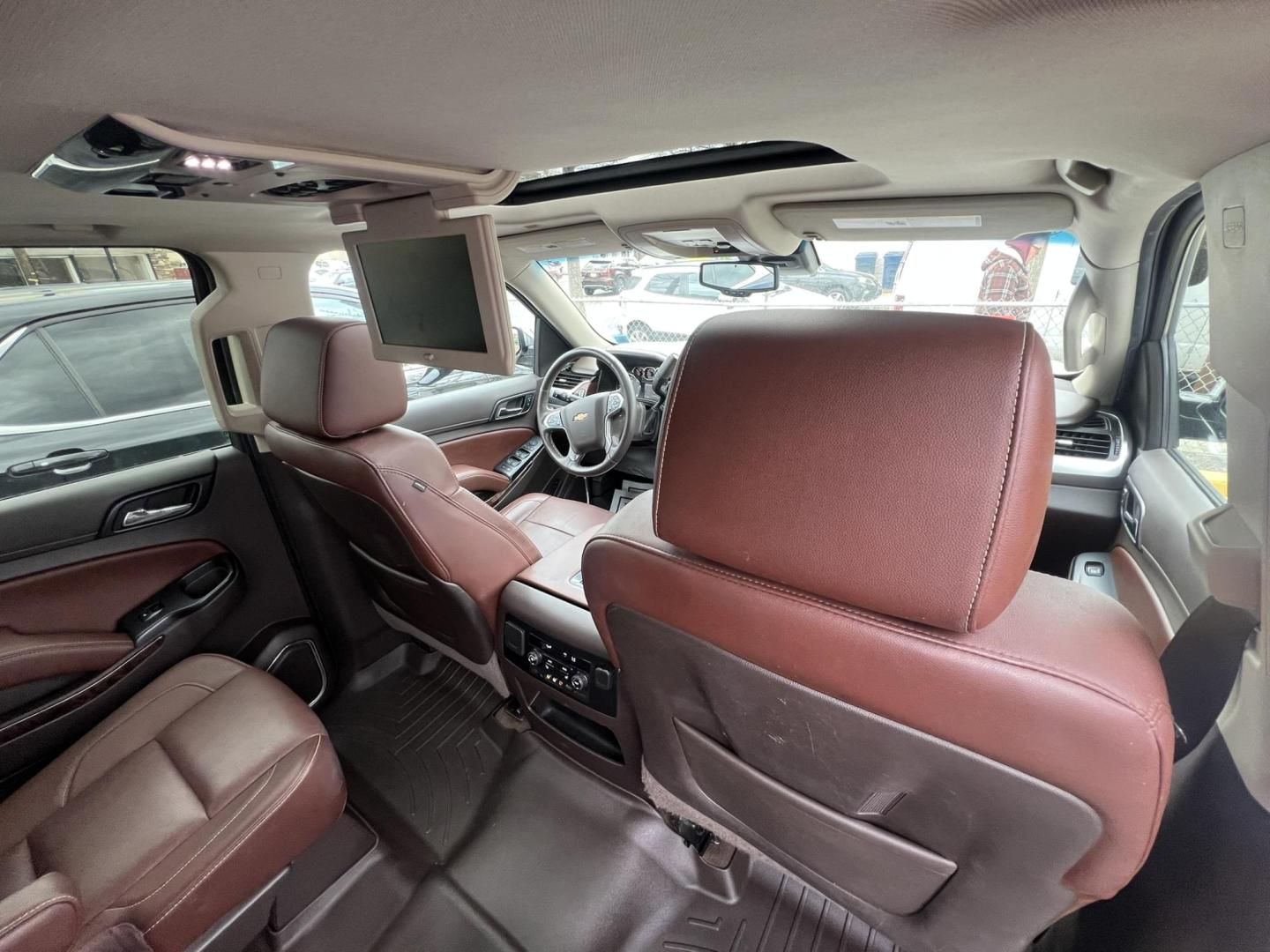 2015 White /Burgundy Chevrolet Suburban LTZ 1500 4WD (1GNSKKKCXFR) with an 5.3L V8 OHV 16V engine, 6-Speed Automatic transmission, located at 1018 Brunswick Ave, Trenton, NJ, 08638, (609) 989-0900, 40.240086, -74.748085 - Photo#18