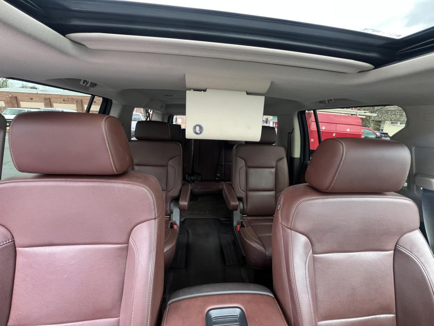 2015 White /Burgundy Chevrolet Suburban LTZ 1500 4WD (1GNSKKKCXFR) with an 5.3L V8 OHV 16V engine, 6-Speed Automatic transmission, located at 1018 Brunswick Ave, Trenton, NJ, 08638, (609) 989-0900, 40.240086, -74.748085 - Photo#21