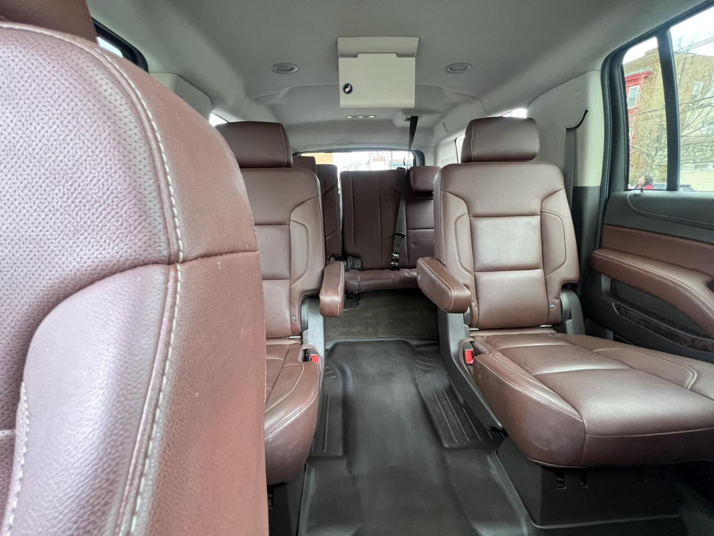 2015 White /Burgundy Chevrolet Suburban LTZ 1500 4WD (1GNSKKKCXFR) with an 5.3L V8 OHV 16V engine, 6-Speed Automatic transmission, located at 1018 Brunswick Ave, Trenton, NJ, 08638, (609) 989-0900, 40.240086, -74.748085 - Photo#22