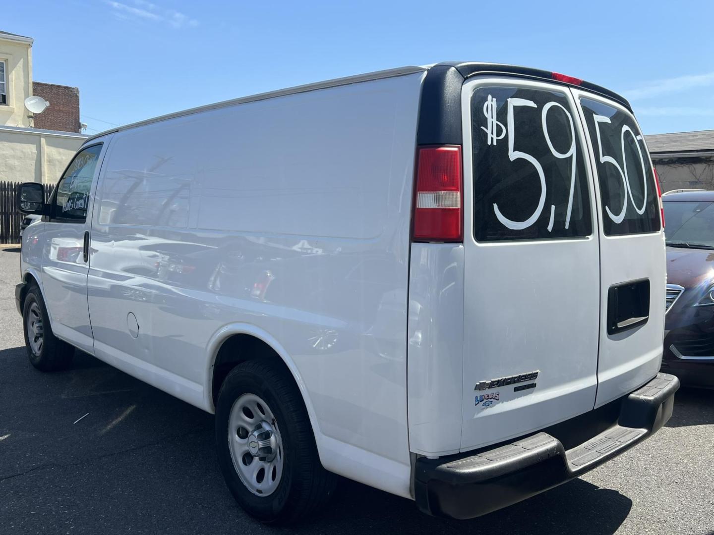 2013 White /Gray Chevrolet Express 1500 Cargo (1GCSGAFX9D1) with an 4.3L V6 OHV 12V engine, 4-Speed Automatic transmission, located at 1018 Brunswick Ave, Trenton, NJ, 08638, (609) 989-0900, 40.240086, -74.748085 - Photo#3