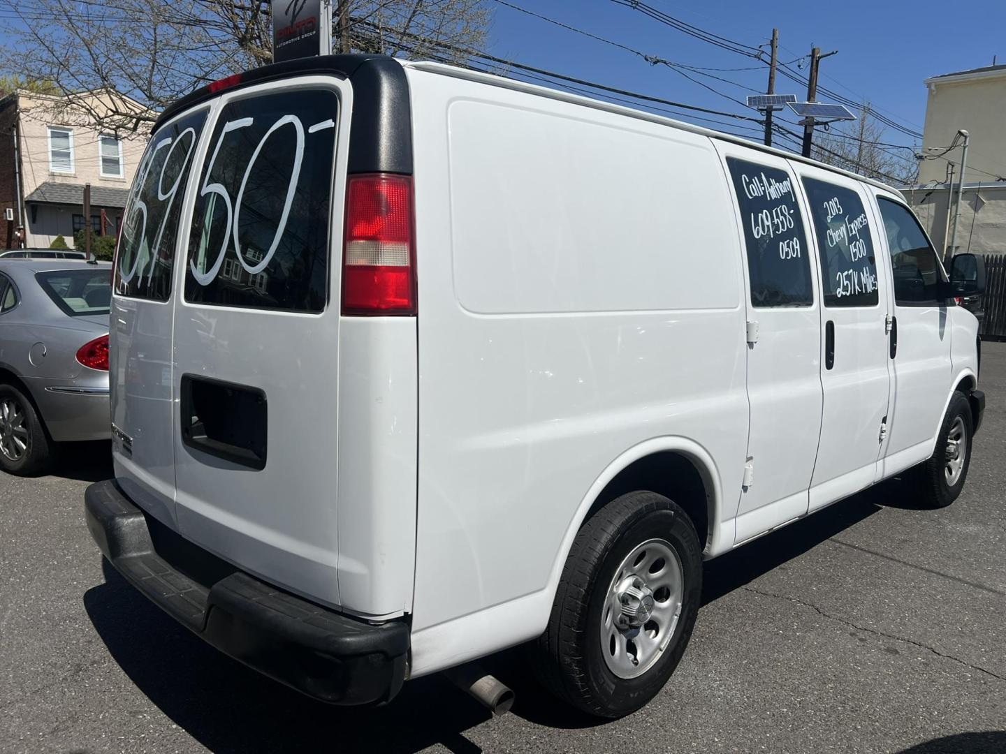 2013 White /Gray Chevrolet Express 1500 Cargo (1GCSGAFX9D1) with an 4.3L V6 OHV 12V engine, 4-Speed Automatic transmission, located at 1018 Brunswick Ave, Trenton, NJ, 08638, (609) 989-0900, 40.240086, -74.748085 - Photo#2