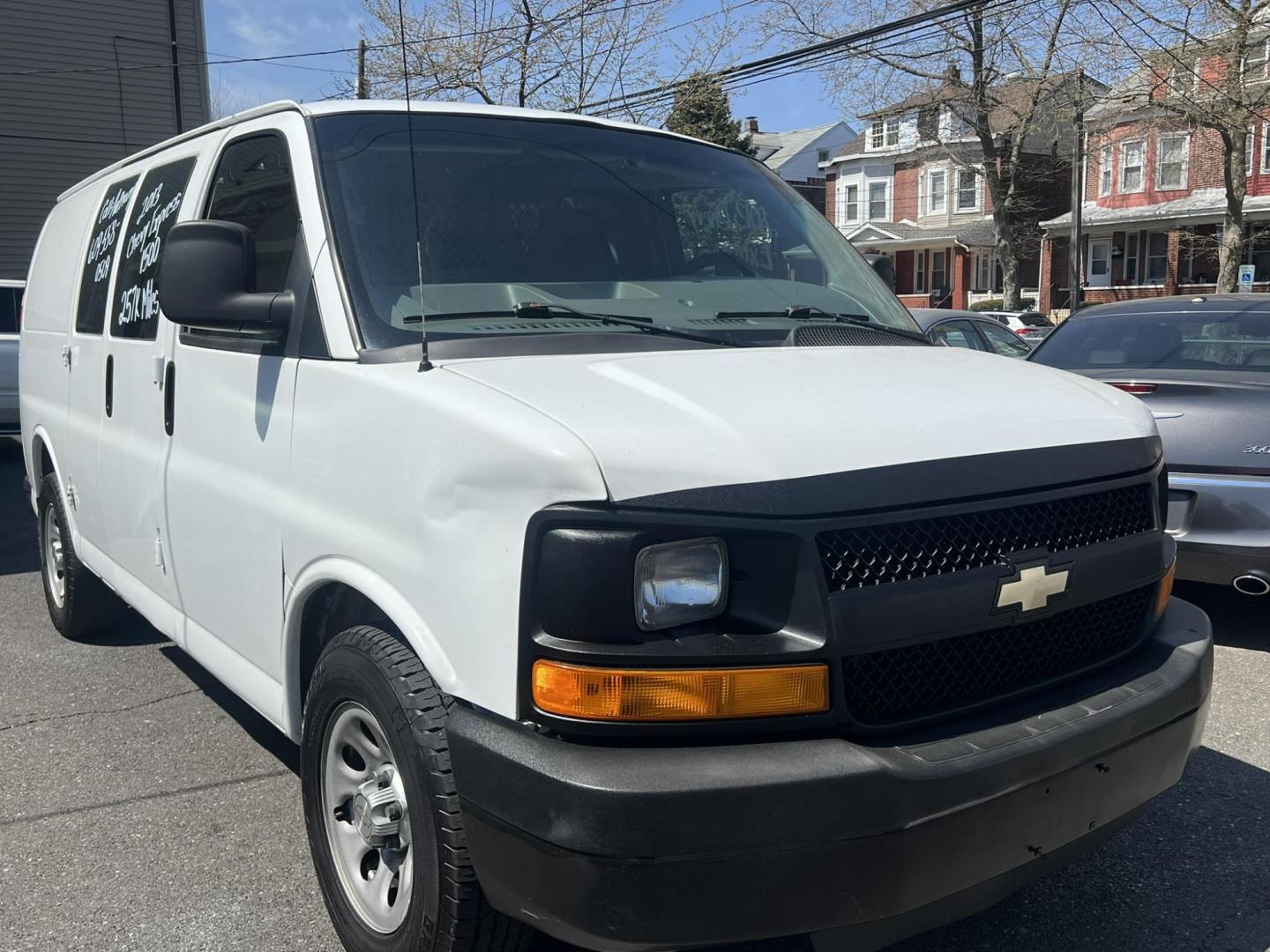 2013 White /Gray Chevrolet Express 1500 Cargo (1GCSGAFX9D1) with an 4.3L V6 OHV 12V engine, 4-Speed Automatic transmission, located at 1018 Brunswick Ave, Trenton, NJ, 08638, (609) 989-0900, 40.240086, -74.748085 - Photo#4