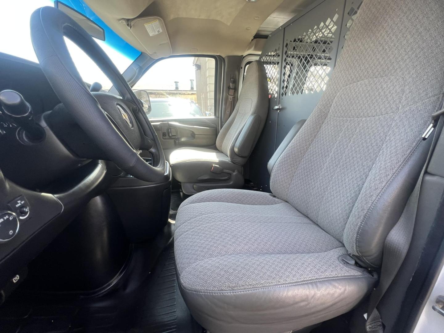 2013 White /Gray Chevrolet Express 1500 Cargo (1GCSGAFX9D1) with an 4.3L V6 OHV 12V engine, 4-Speed Automatic transmission, located at 1018 Brunswick Ave, Trenton, NJ, 08638, (609) 989-0900, 40.240086, -74.748085 - Photo#8