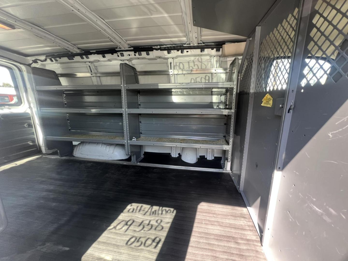 2013 White /Gray Chevrolet Express 1500 Cargo (1GCSGAFX9D1) with an 4.3L V6 OHV 12V engine, 4-Speed Automatic transmission, located at 1018 Brunswick Ave, Trenton, NJ, 08638, (609) 989-0900, 40.240086, -74.748085 - Photo#11