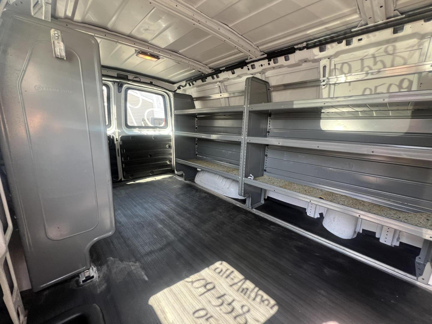 2013 White /Gray Chevrolet Express 1500 Cargo (1GCSGAFX9D1) with an 4.3L V6 OHV 12V engine, 4-Speed Automatic transmission, located at 1018 Brunswick Ave, Trenton, NJ, 08638, (609) 989-0900, 40.240086, -74.748085 - Photo#12