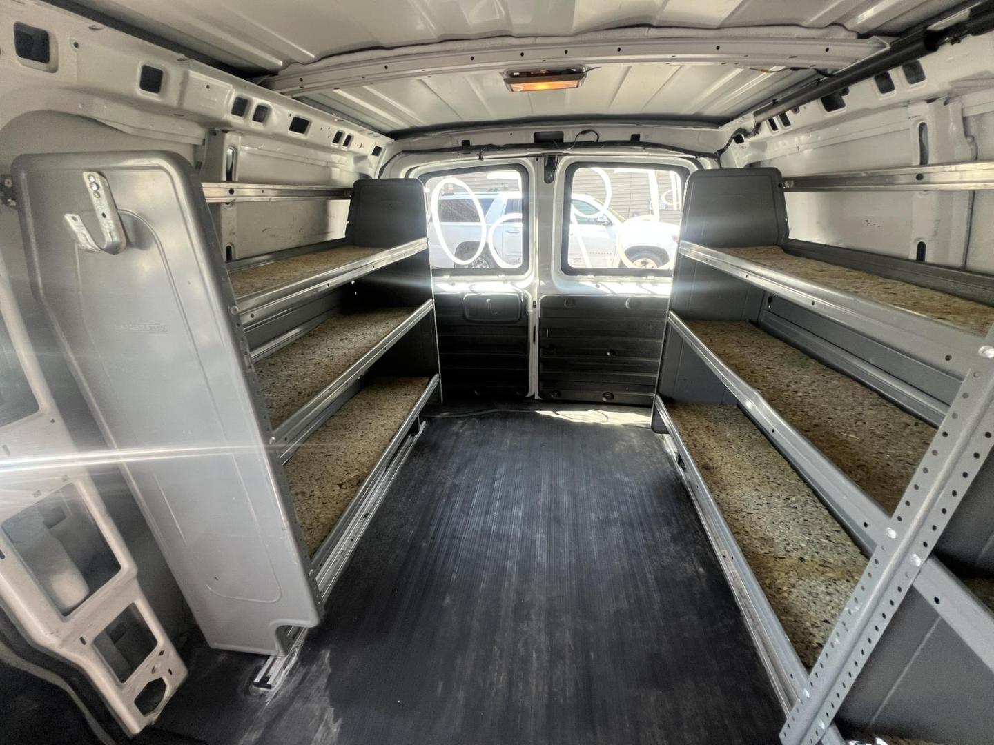 2013 White /Gray Chevrolet Express 1500 Cargo (1GCSGAFX9D1) with an 4.3L V6 OHV 12V engine, 4-Speed Automatic transmission, located at 1018 Brunswick Ave, Trenton, NJ, 08638, (609) 989-0900, 40.240086, -74.748085 - Photo#13