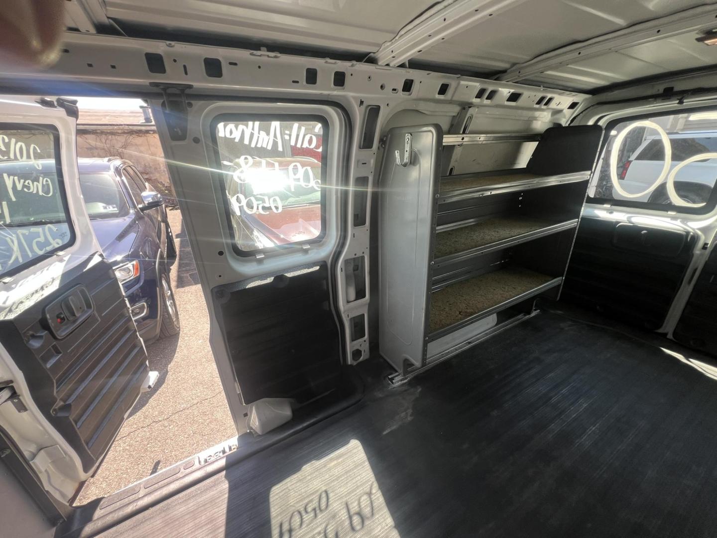 2013 White /Gray Chevrolet Express 1500 Cargo (1GCSGAFX9D1) with an 4.3L V6 OHV 12V engine, 4-Speed Automatic transmission, located at 1018 Brunswick Ave, Trenton, NJ, 08638, (609) 989-0900, 40.240086, -74.748085 - Photo#14