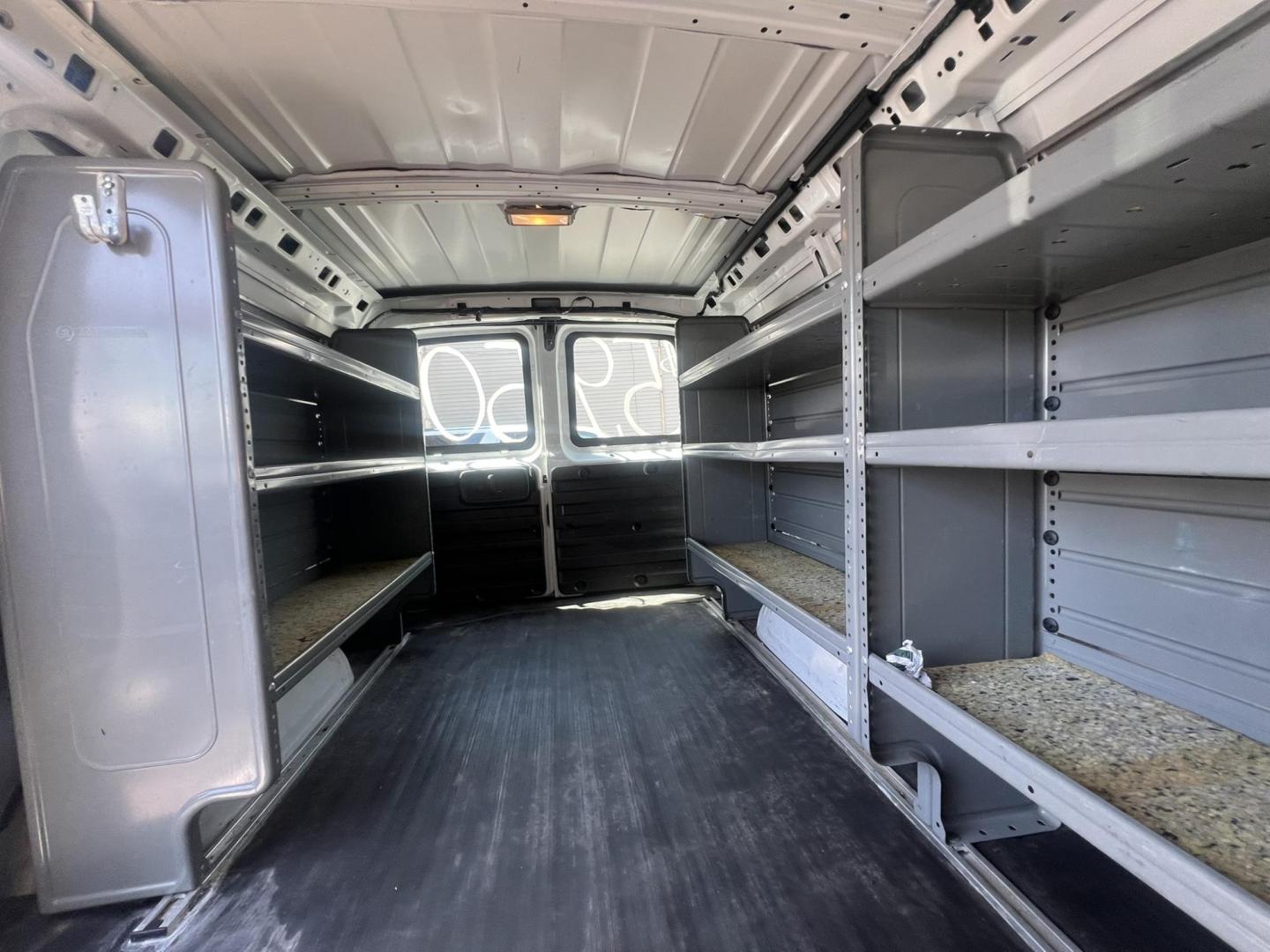 2013 White /Gray Chevrolet Express 1500 Cargo (1GCSGAFX9D1) with an 4.3L V6 OHV 12V engine, 4-Speed Automatic transmission, located at 1018 Brunswick Ave, Trenton, NJ, 08638, (609) 989-0900, 40.240086, -74.748085 - Photo#16