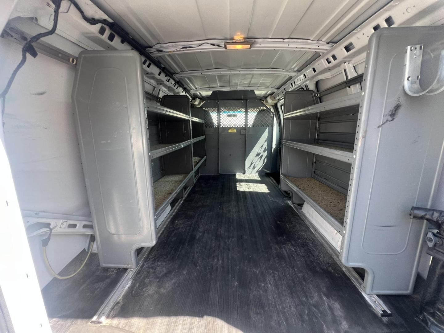 2013 White /Gray Chevrolet Express 1500 Cargo (1GCSGAFX9D1) with an 4.3L V6 OHV 12V engine, 4-Speed Automatic transmission, located at 1018 Brunswick Ave, Trenton, NJ, 08638, (609) 989-0900, 40.240086, -74.748085 - Photo#19