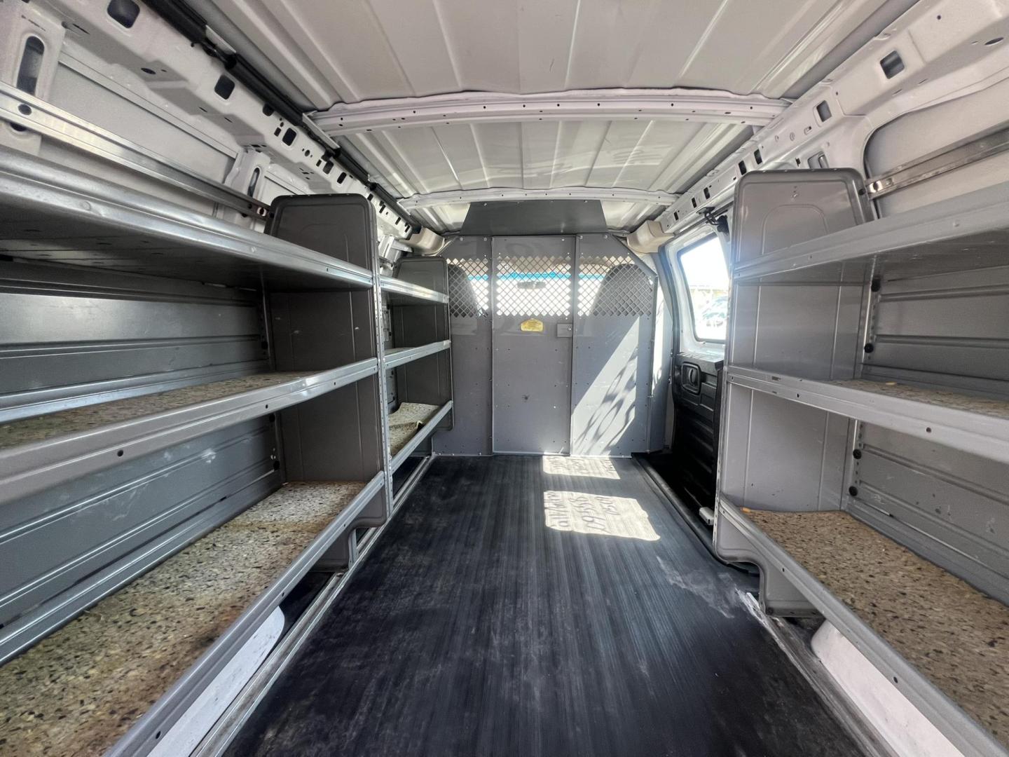 2013 White /Gray Chevrolet Express 1500 Cargo (1GCSGAFX9D1) with an 4.3L V6 OHV 12V engine, 4-Speed Automatic transmission, located at 1018 Brunswick Ave, Trenton, NJ, 08638, (609) 989-0900, 40.240086, -74.748085 - Photo#20