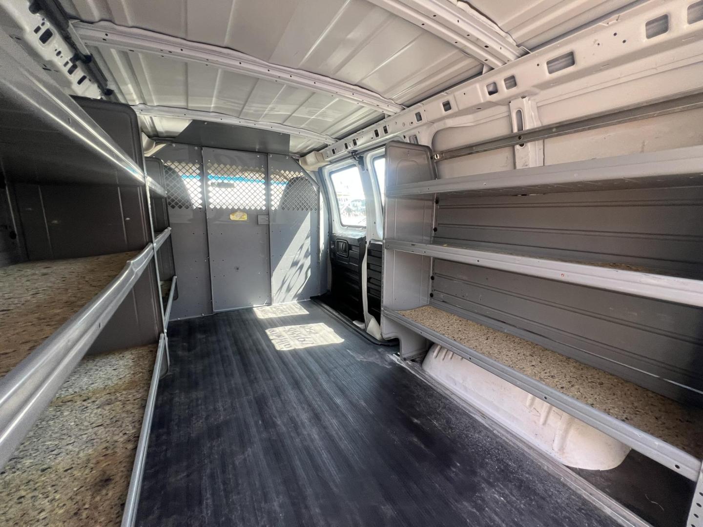 2013 White /Gray Chevrolet Express 1500 Cargo (1GCSGAFX9D1) with an 4.3L V6 OHV 12V engine, 4-Speed Automatic transmission, located at 1018 Brunswick Ave, Trenton, NJ, 08638, (609) 989-0900, 40.240086, -74.748085 - Photo#21