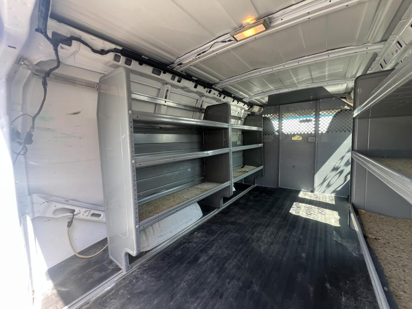 2013 White /Gray Chevrolet Express 1500 Cargo (1GCSGAFX9D1) with an 4.3L V6 OHV 12V engine, 4-Speed Automatic transmission, located at 1018 Brunswick Ave, Trenton, NJ, 08638, (609) 989-0900, 40.240086, -74.748085 - Photo#22