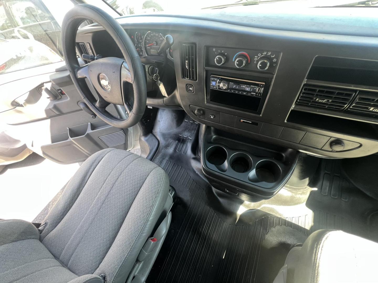 2013 White /Gray Chevrolet Express 1500 Cargo (1GCSGAFX9D1) with an 4.3L V6 OHV 12V engine, 4-Speed Automatic transmission, located at 1018 Brunswick Ave, Trenton, NJ, 08638, (609) 989-0900, 40.240086, -74.748085 - Photo#24
