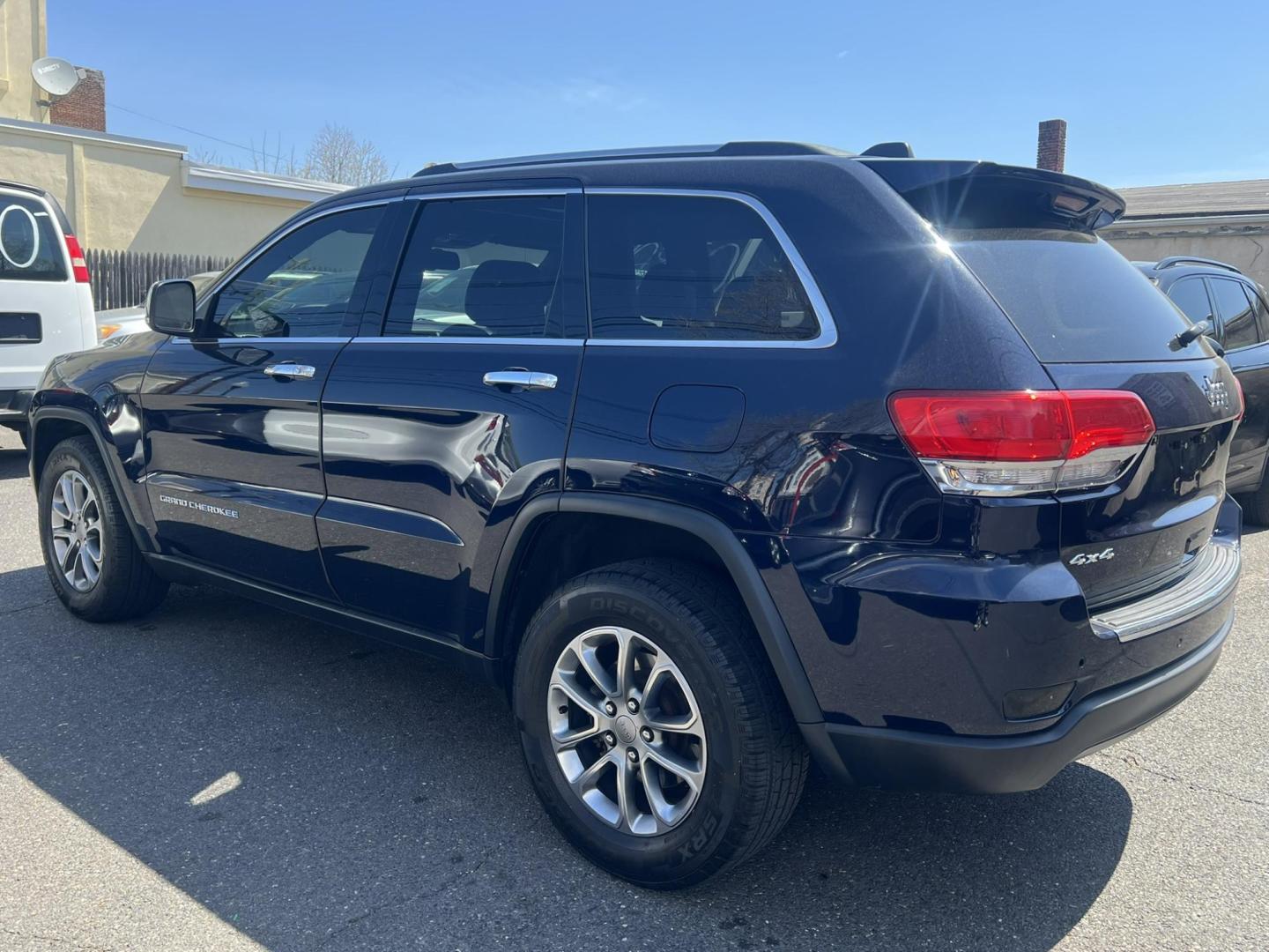 2015 Blue /Black Leather Jeep Grand Cherokee Limited 4WD (1C4RJFBG2FC) with an 3.6L V6 DOHC 24V engine, 8-Speed Automatic transmission, located at 1018 Brunswick Ave, Trenton, NJ, 08638, (609) 989-0900, 40.240086, -74.748085 - Photo#4