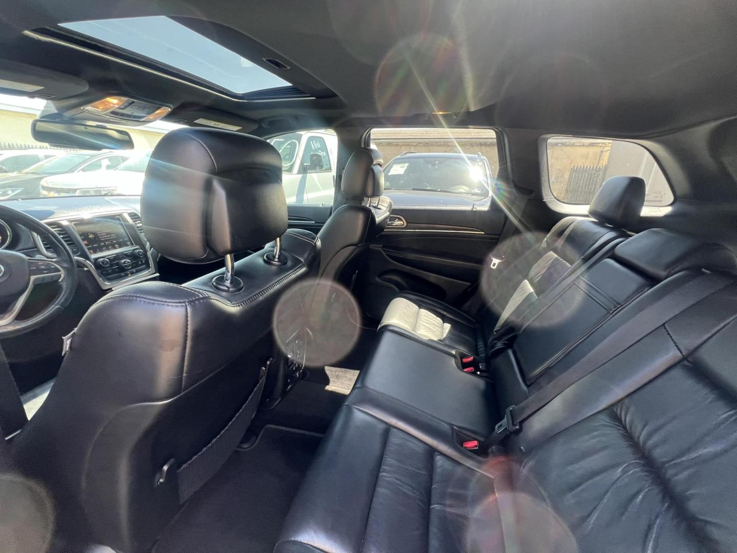 2015 Blue /Black Leather Jeep Grand Cherokee Limited 4WD (1C4RJFBG2FC) with an 3.6L V6 DOHC 24V engine, 8-Speed Automatic transmission, located at 1018 Brunswick Ave, Trenton, NJ, 08638, (609) 989-0900, 40.240086, -74.748085 - Photo#9
