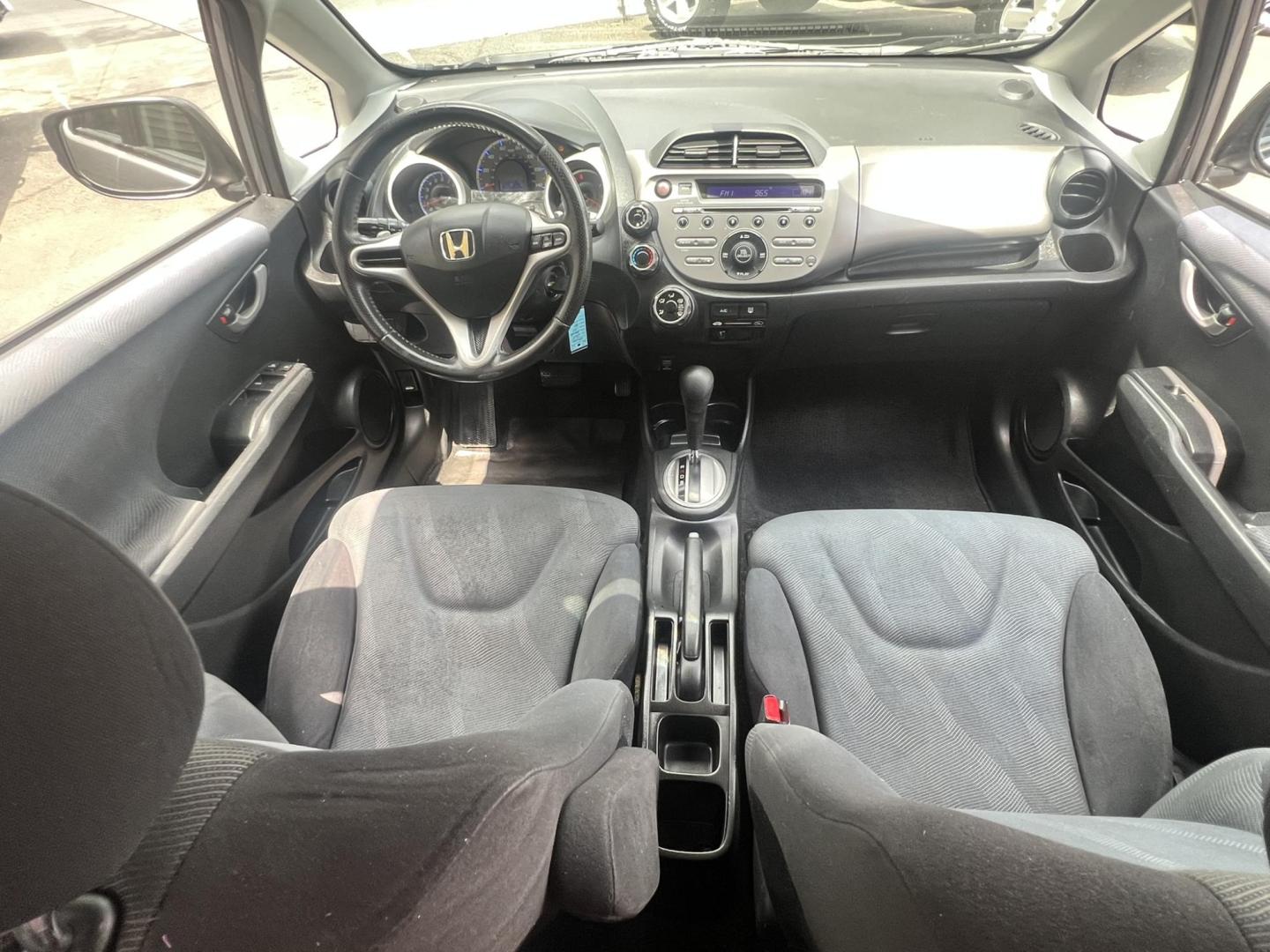 2009 GRAY /Gray Honda Fit Sport 5-Speed AT (JHMGE88419C) with an 1.5L L4 SOHC 16V engine, 5-Speed Automatic Overdrive transmission, located at 1018 Brunswick Ave, Trenton, NJ, 08638, (609) 989-0900, 40.240086, -74.748085 - Photo#19