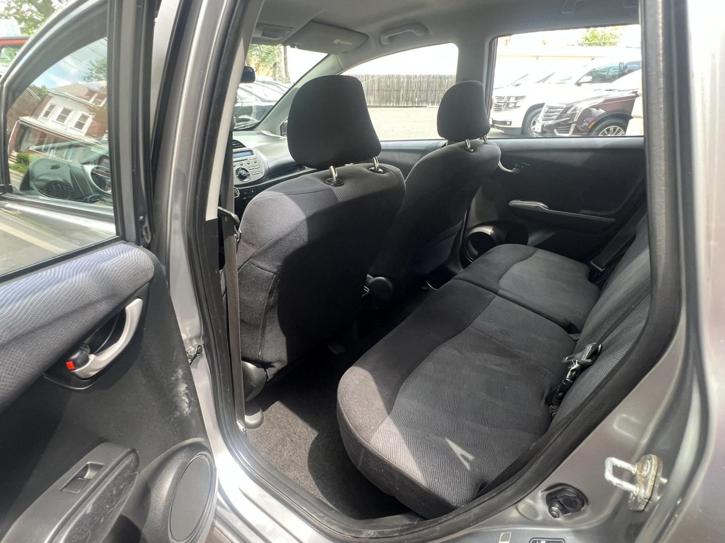 2009 GRAY /Gray Honda Fit Sport (JHMGE88419C) with an 1.5L L4 SOHC 16V engine, Automatic transmission, located at 1018 Brunswick Ave, Trenton, NJ, 08638, (609) 989-0900, 40.240086, -74.748085 - Photo#22